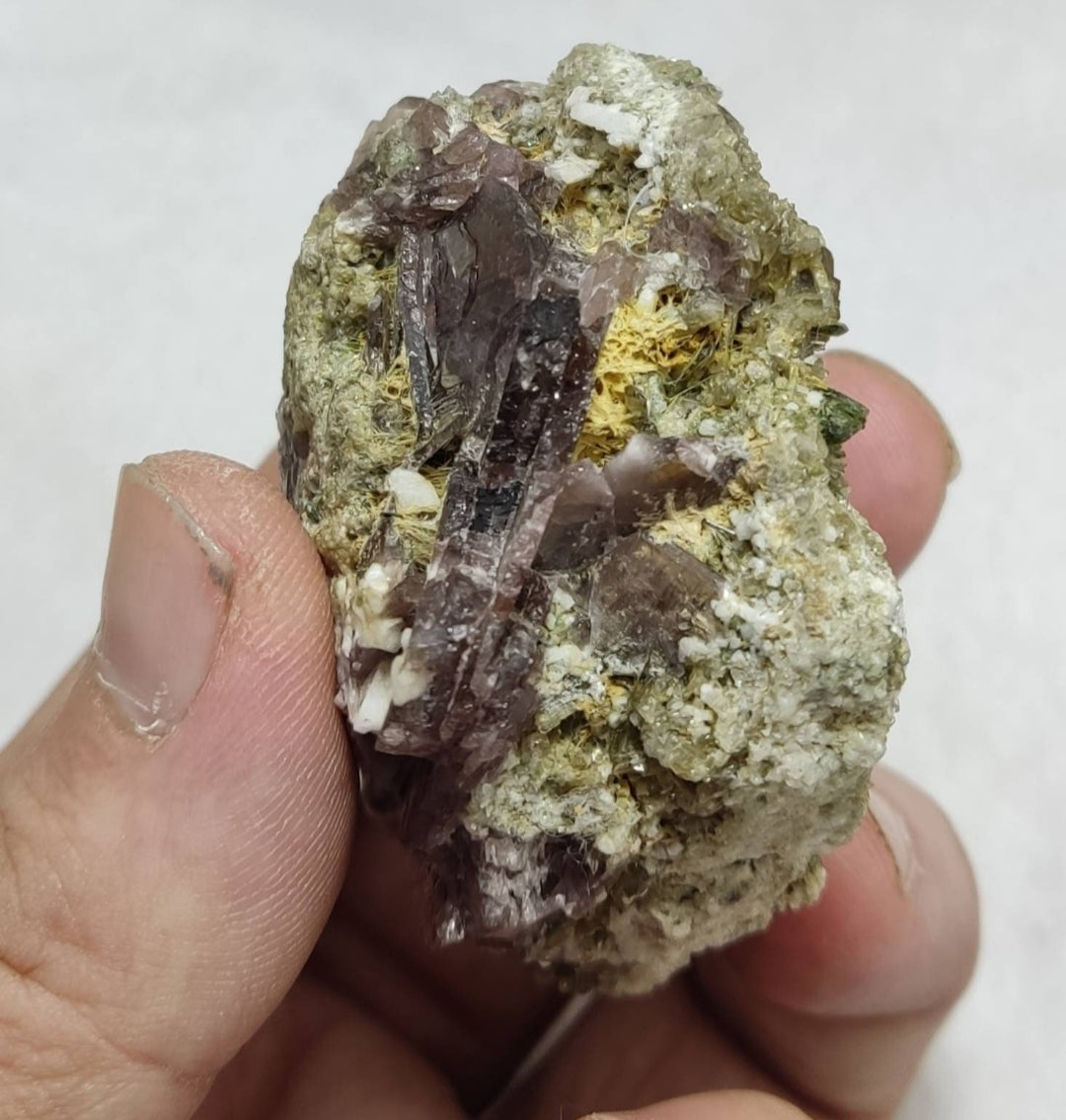 Axinite crystals on matrix with the epidote 139 grams