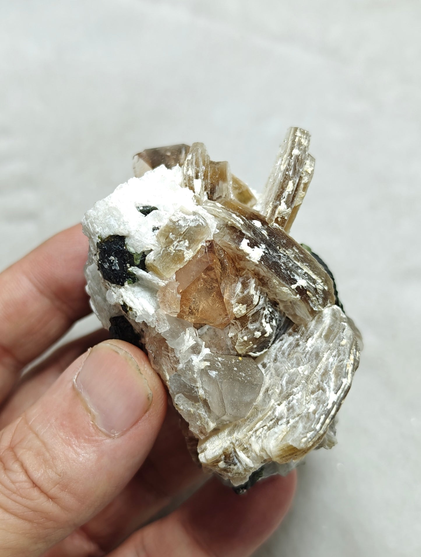 peach color Topaz crystals with quartz and tourmaline 210 grams