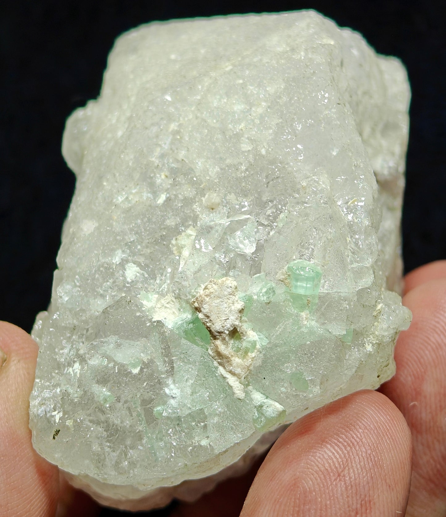 Natural etched pollucite with green tourmalines 260 grams