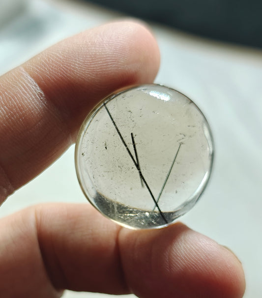 Tourmaline included smoky Quartz cabochon 64 carats