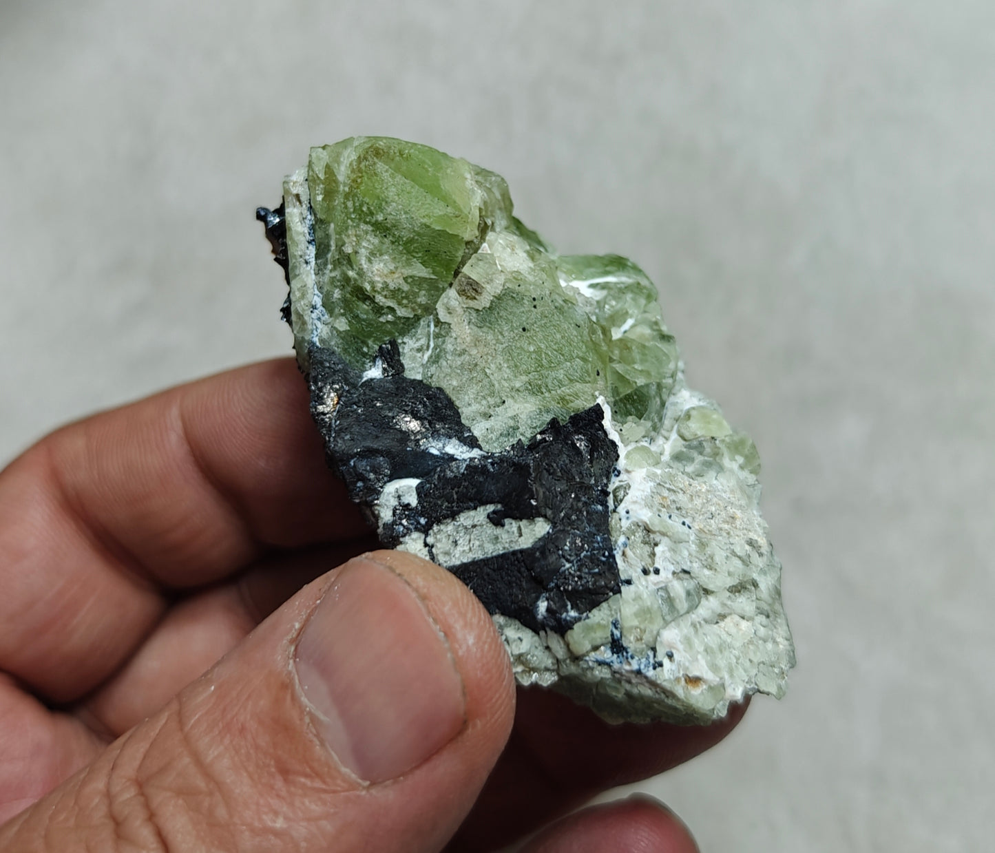 Peridot crystals with magnetite 84 grams