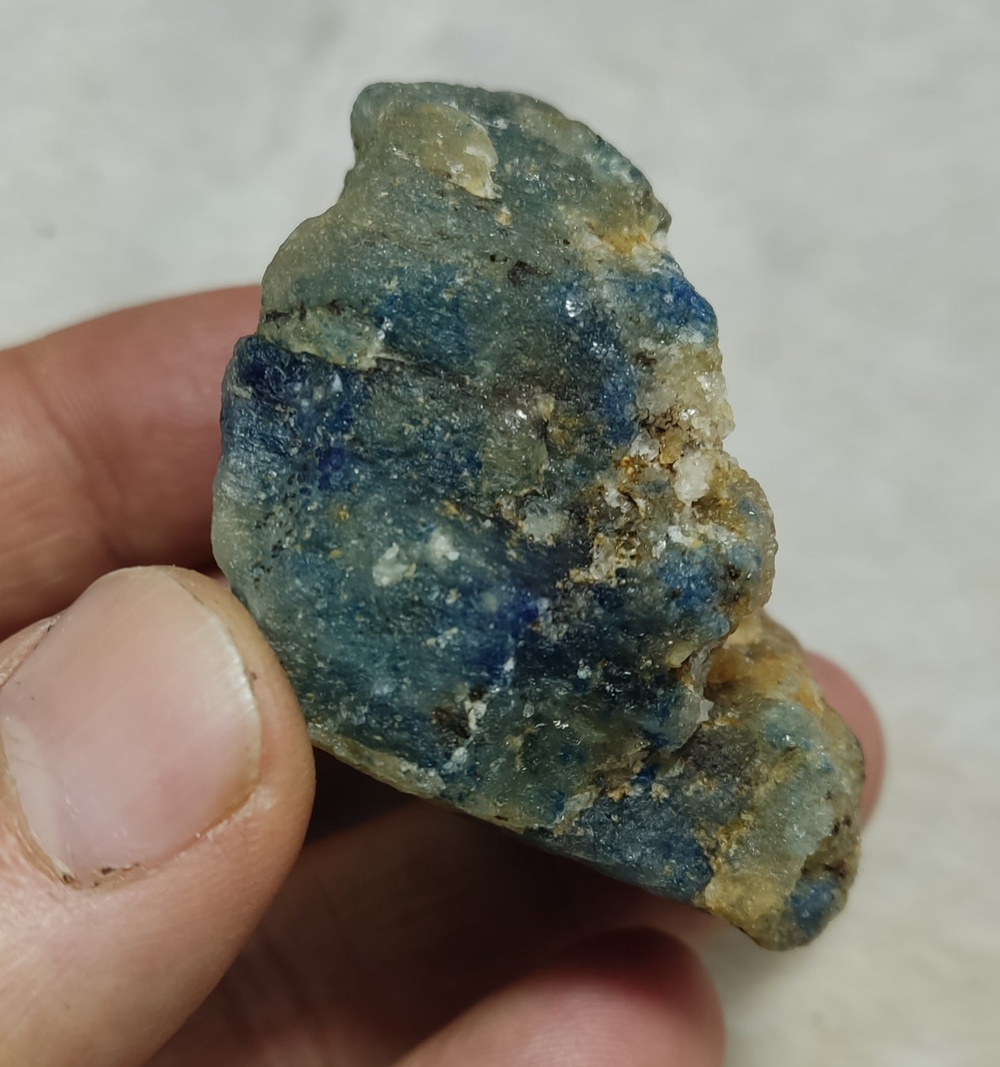 Partly Fluorescent natural afghanite/sodalite on matrix 87 grams