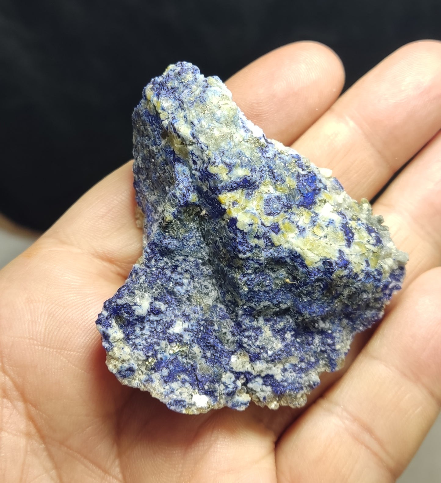 Partly Fluorescent lazurite with Pyrite 73 grams