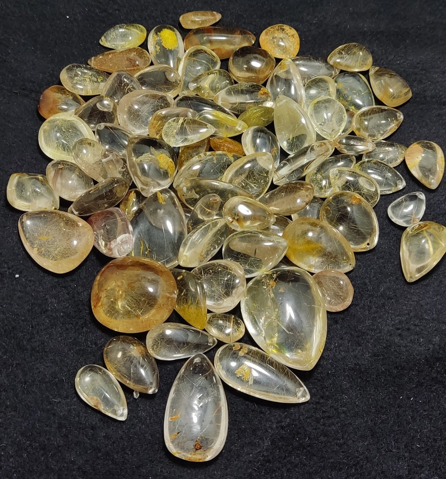 525 grams Rutilated polished quartz tumbles-cabochons
