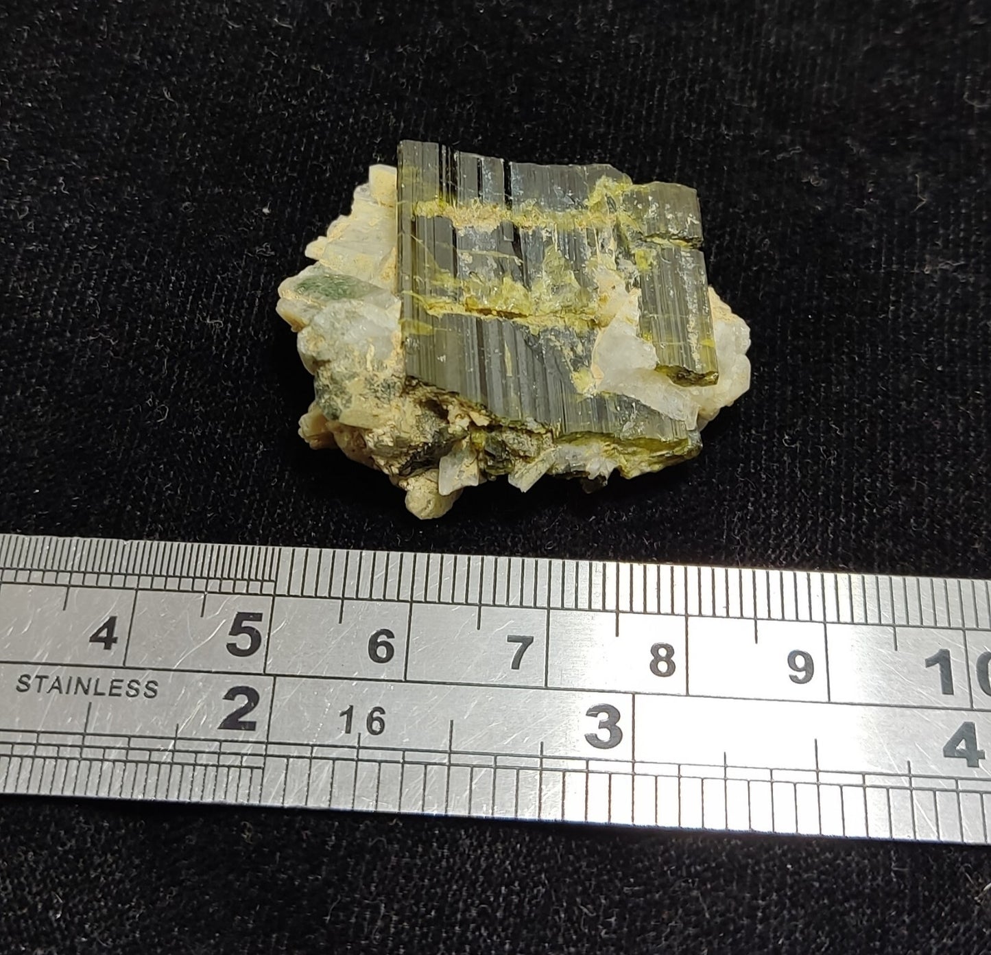 An Aesthetic Naturally terminated specimen of epidote with quartz 16 grams