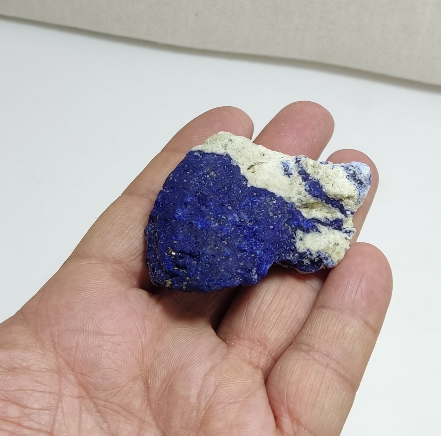 An Aesthetic specimen of fluorescent Lazurite with Pyrite 62 grams