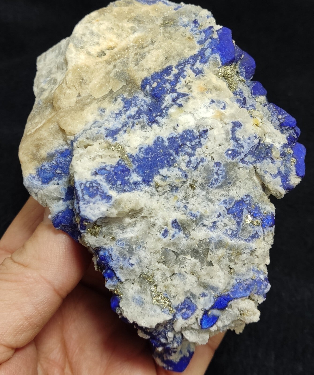 An Aesthetic specimen of fluorescent Lazurite with pyrite 489 grams