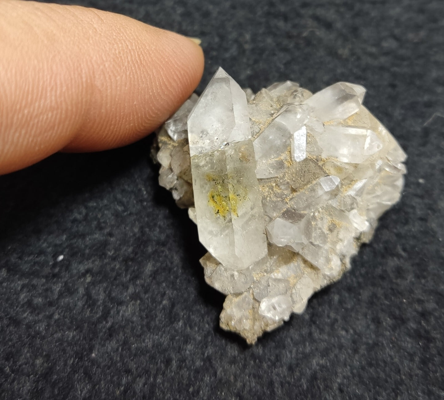 An Aesthetic quartz/calcite crystal specimen with petroleum inclusions 15 grams