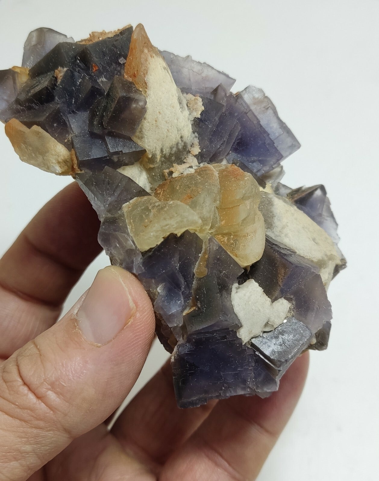An amazing specimen of cubic purplish color Fluorite with calcite 263 grams