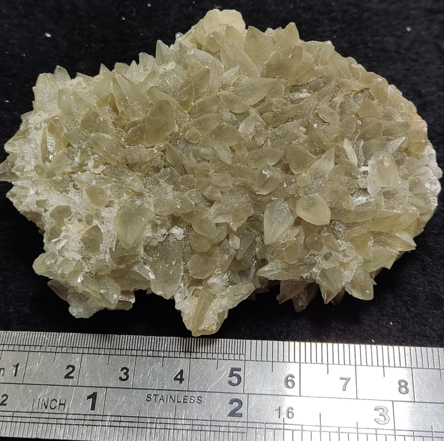 An Aesthetic Naturally terminated specimen of dogtooth calcite with fluorite 199 grams