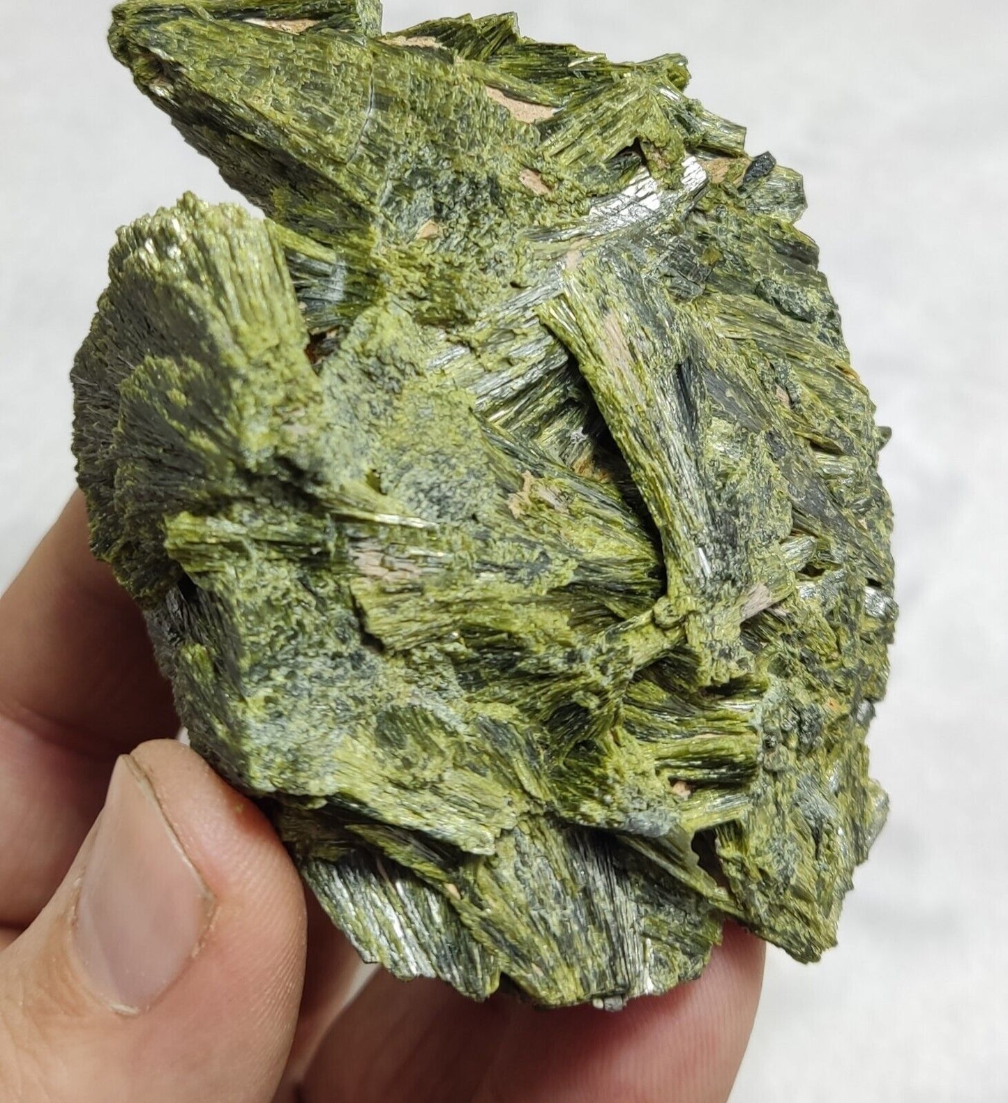 An aesthetic specimen of epidote crystal cluster 208 grams