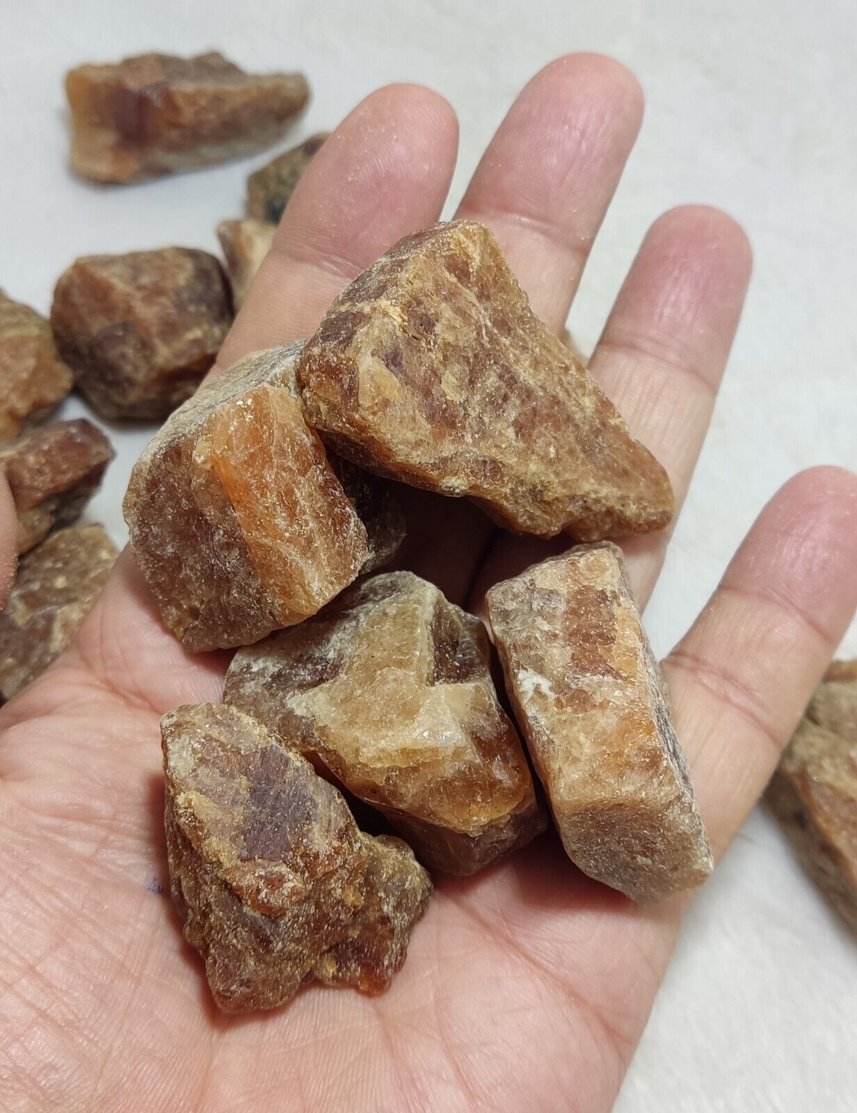 900 grams lot of rough hessonite garnets