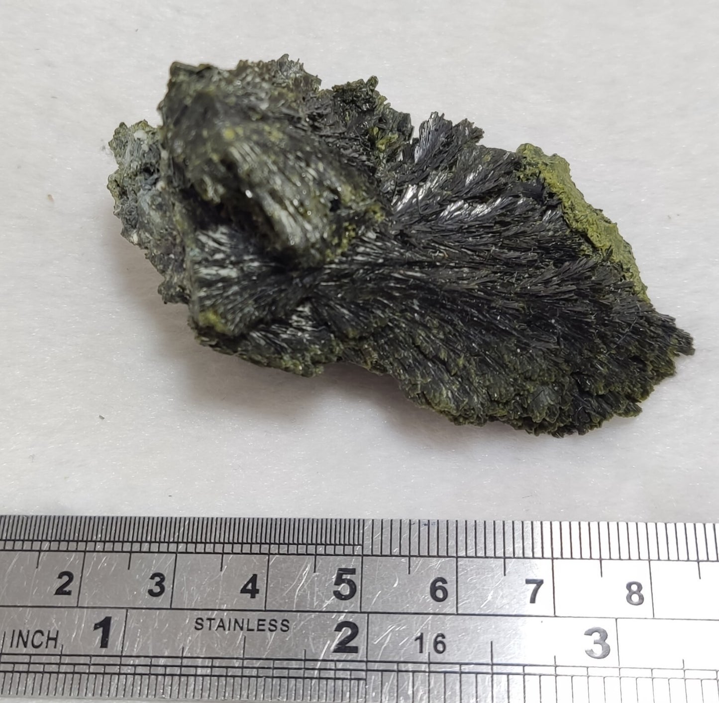 An aesthetic specimen of epidote crystal specimen 82 grams