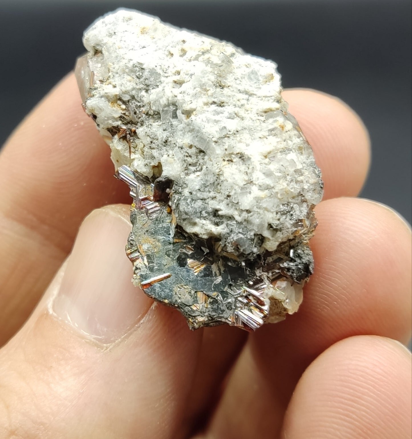 An Aesthetic specimen of quartz crystal with hematite and saginite 16 grams