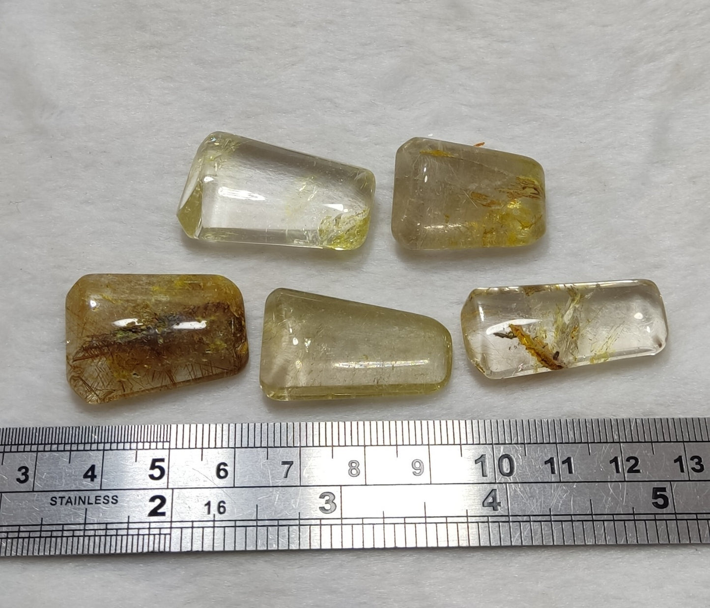 An amazing lot of Rutilated polished quartz tumbles 45 grams