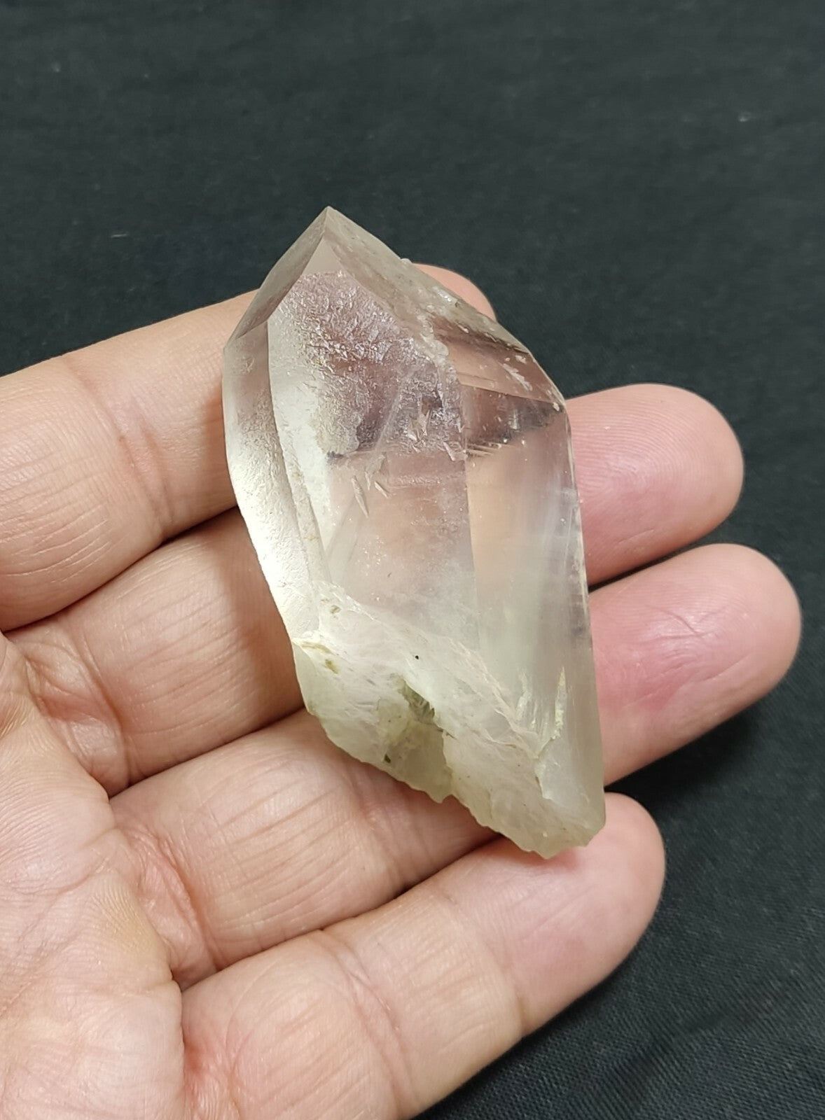 An amazing specimen of terminated Quartz crystal with unique inclusions 67 grams