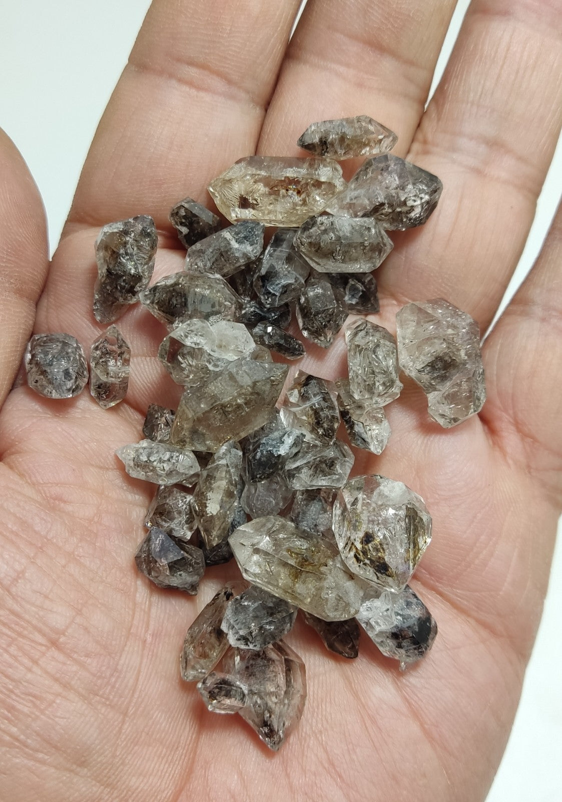 105 grams carbon included quartz crystals