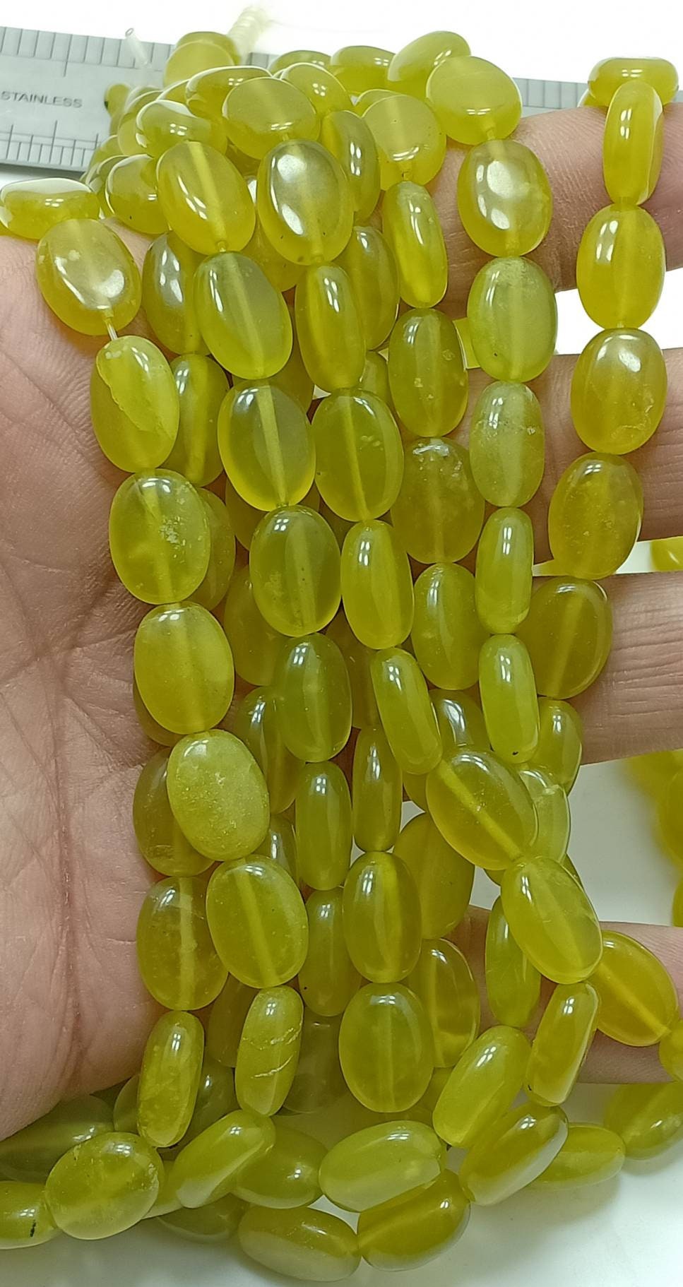 Single High Quality Serpentine drilled beads strand