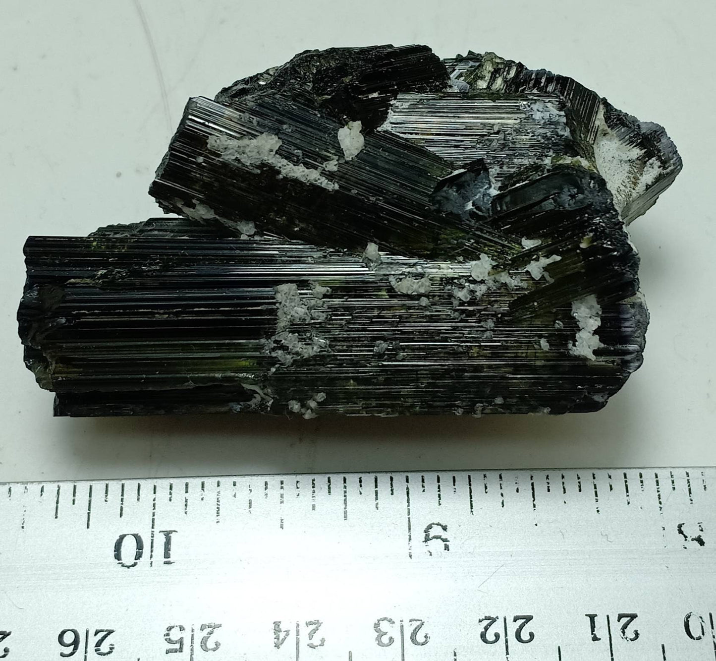Dark green color Tourmaline crystals cluster with chatoyance effect 109 grams
