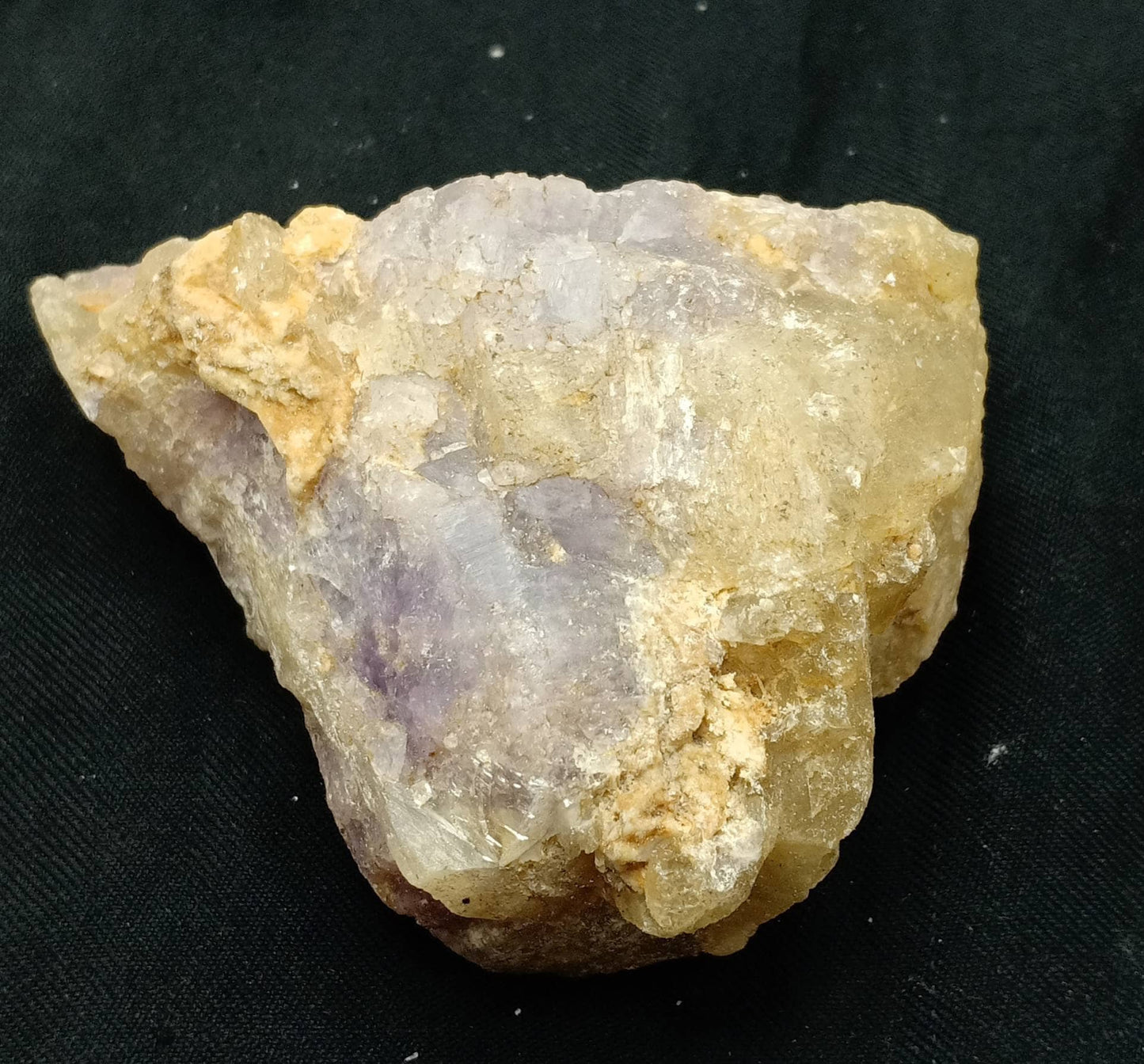 An amazing specimen of UV reactive tenebrescent Fluorescent Hackmanite Chunk with Richterite 161 grams