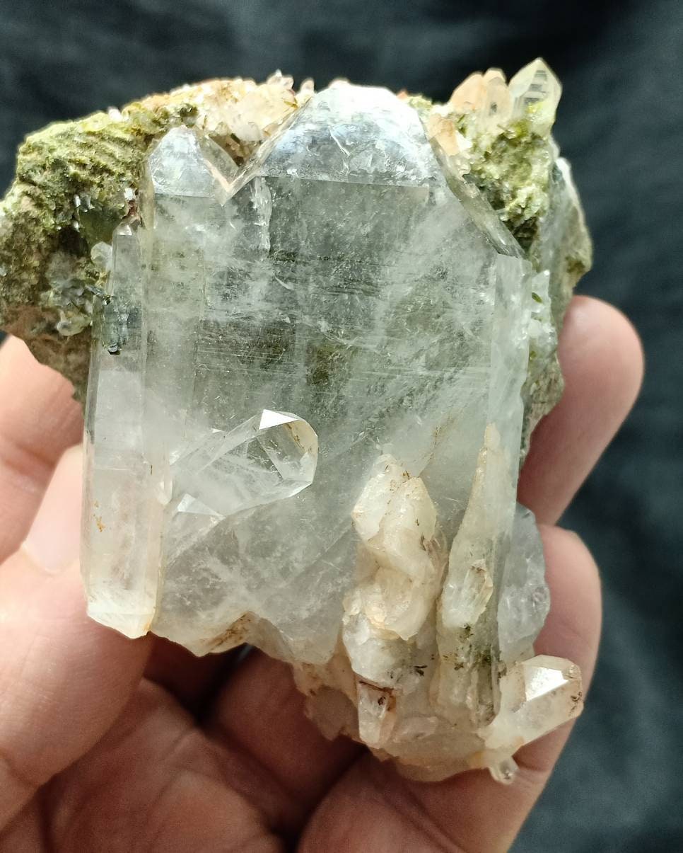 An amazing quartz and Epidote cluster with beautiful terminations 157 grams