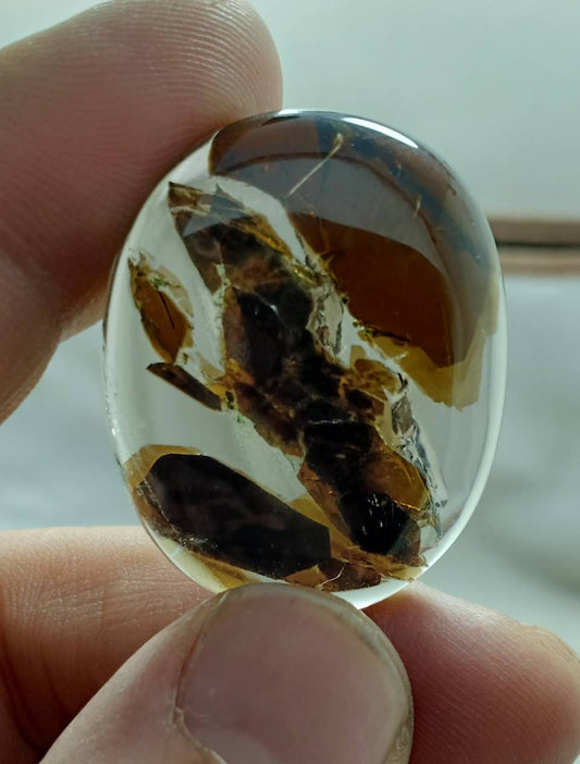Amazing Mica included Quartz cabochon 88 carats