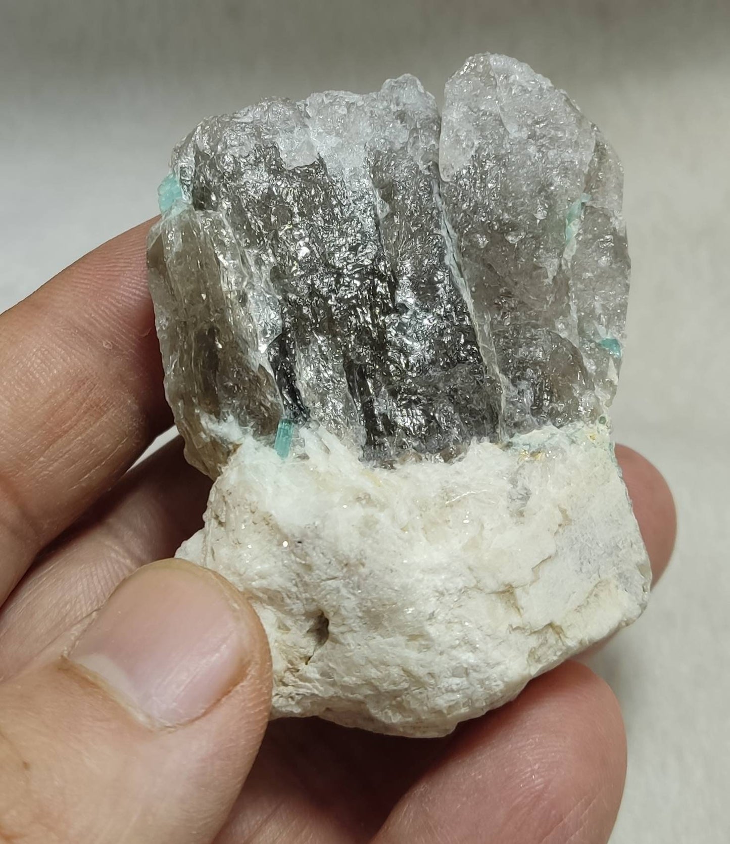 Indicolite Tourmalines crystals with associated smoky Quartz 105 grams