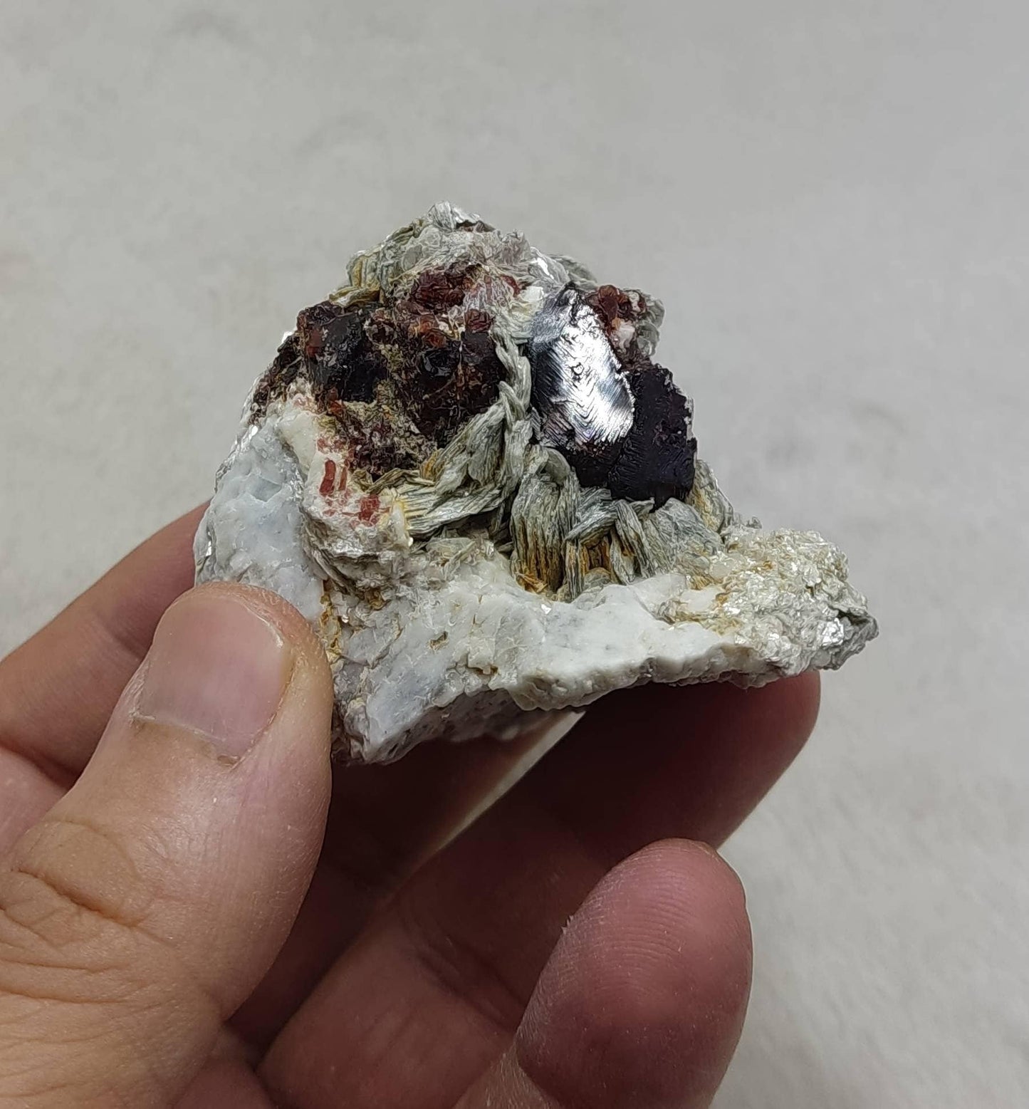 Terminated etched spessartine Garnet crystals on matrix with mica 163 grams