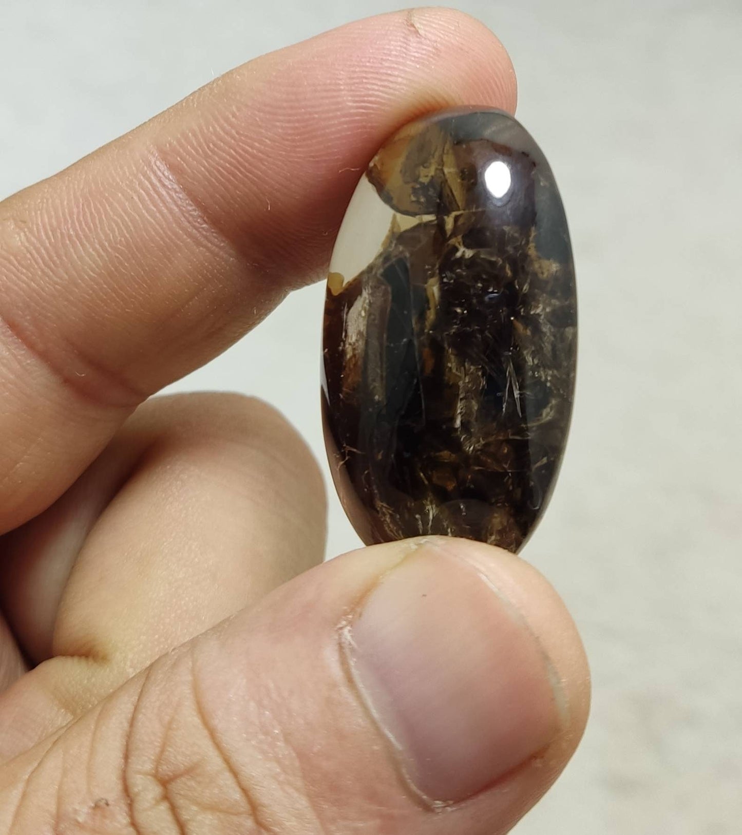 Amazing Mica included Quartz cabochon 93 carats