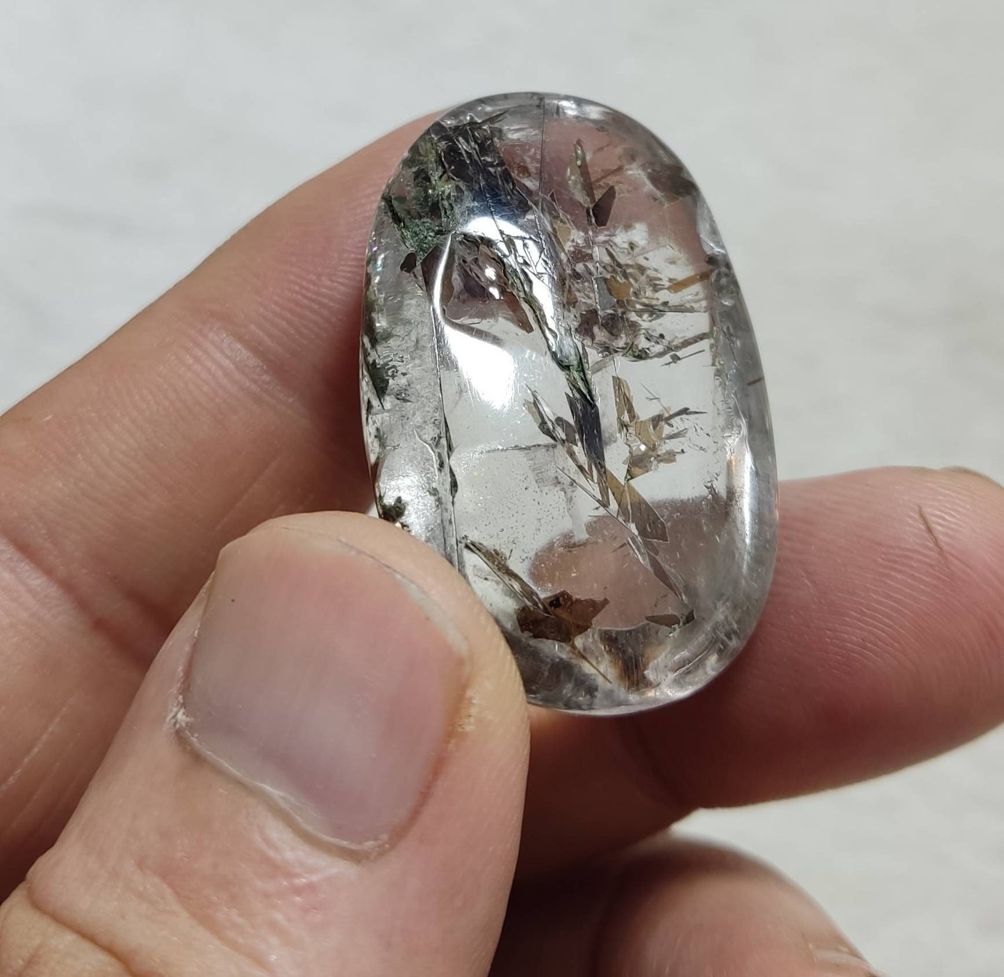 Amazing Mica included Quartz cabochon 119 carats