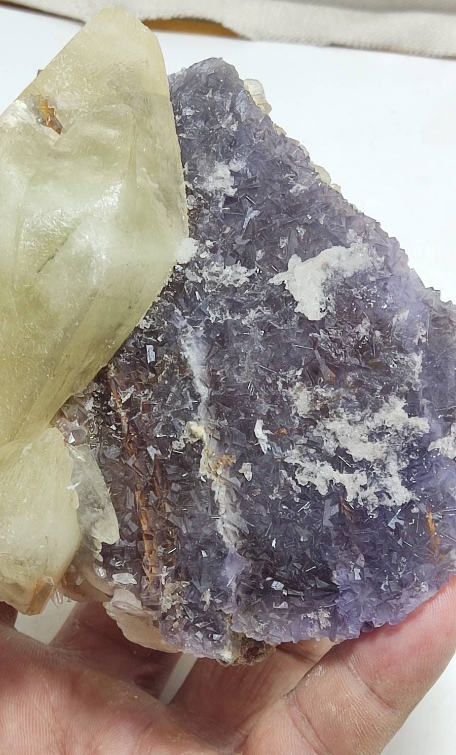 Double terminated calcite crystal on matrix with purple cubic Fluorite crystals 830 grams