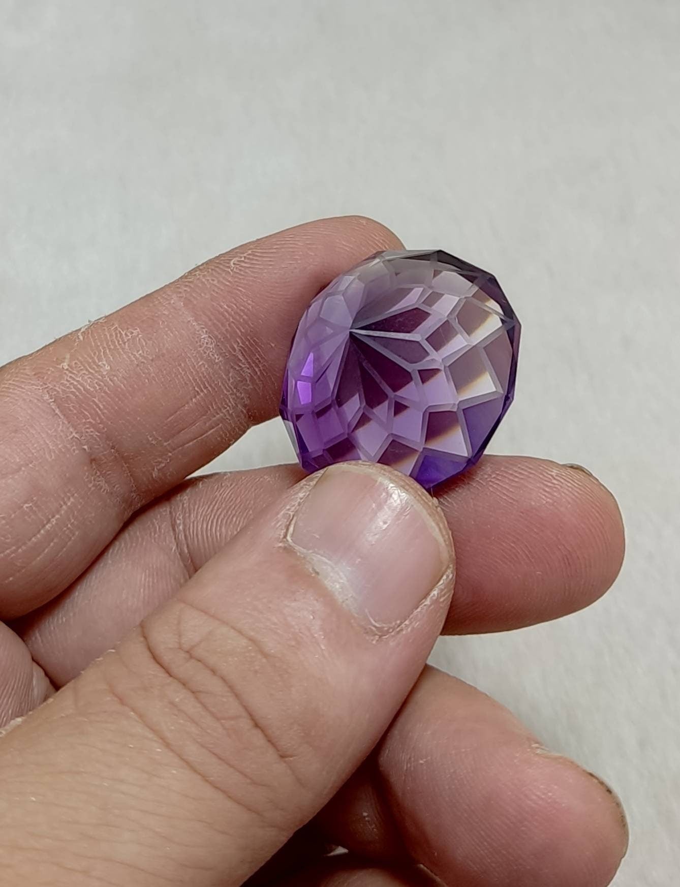 An amazing faceted fancy cut amethyst gemstone 78 carats
