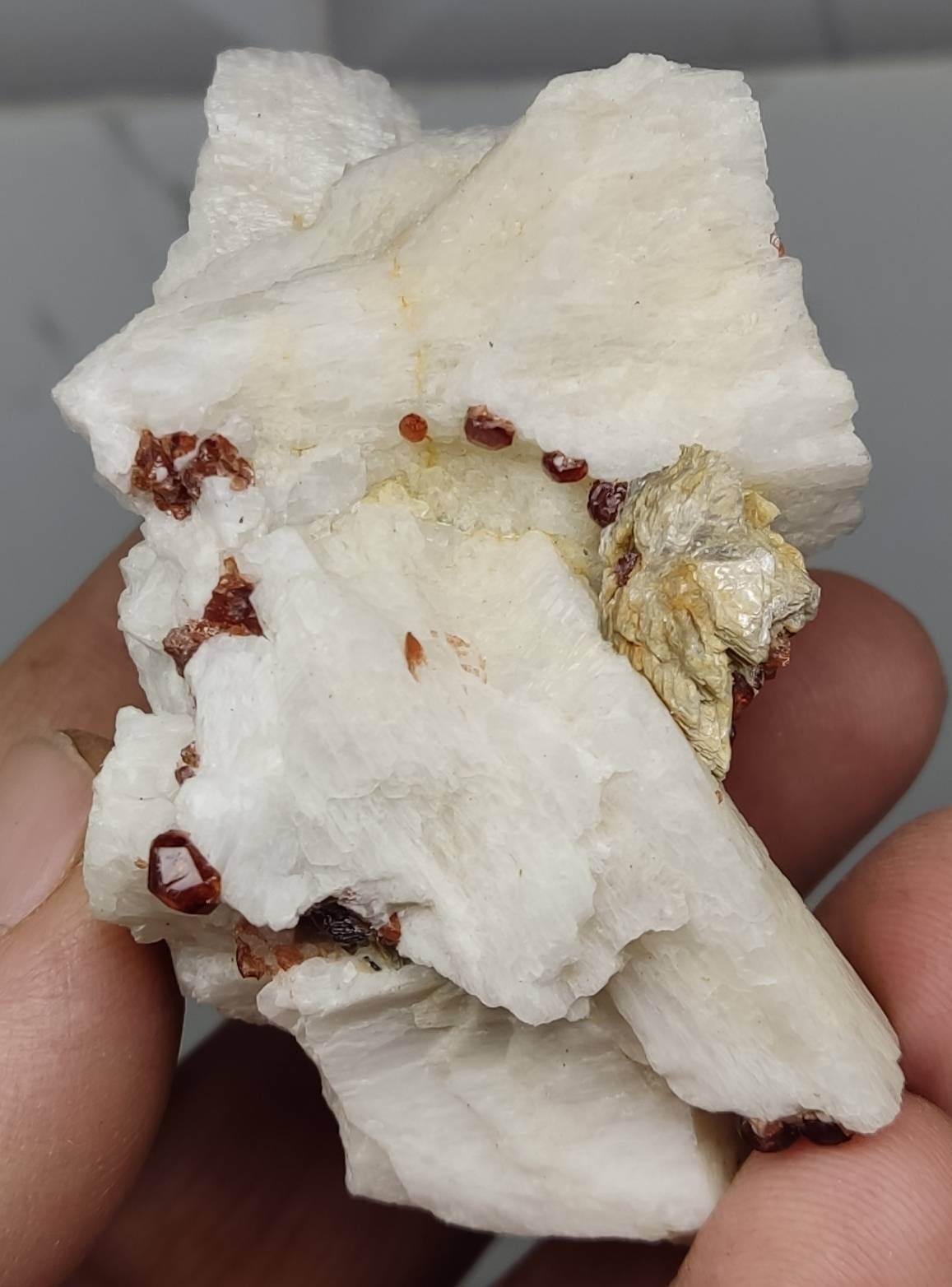 Spessartine Garnet clusters on Albite 114 grams