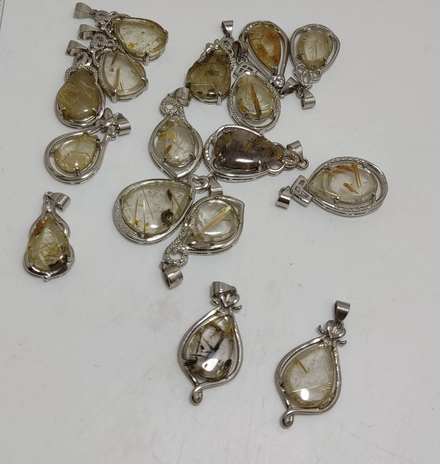 Rutilated polished quartz silver lockets 16 pieces