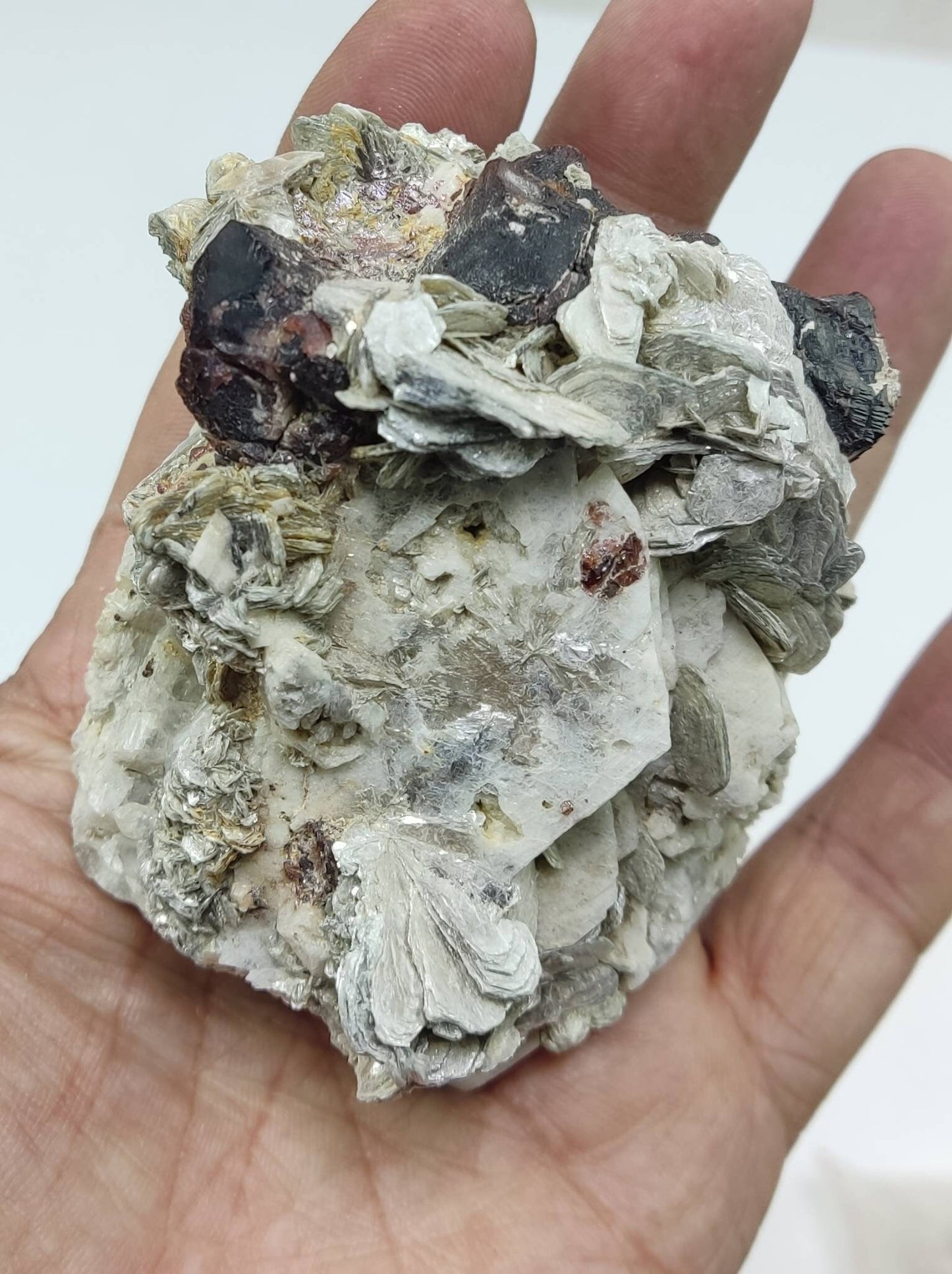 An amazing beautiful specimen of spessartine Garnet crystals on matrix with mica 300 grams