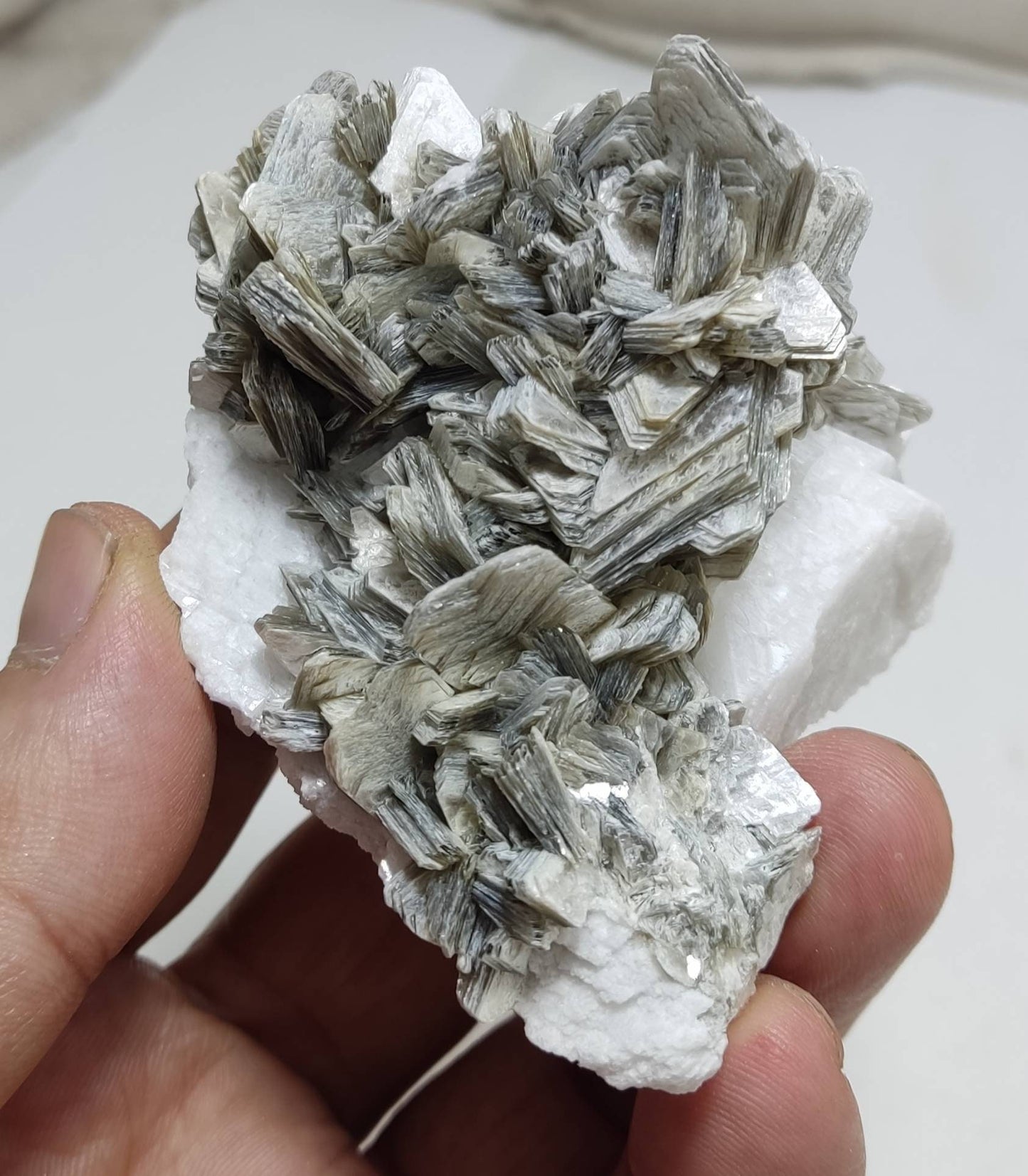 An aesthetic Specimen muscovite on matrix 144 grams