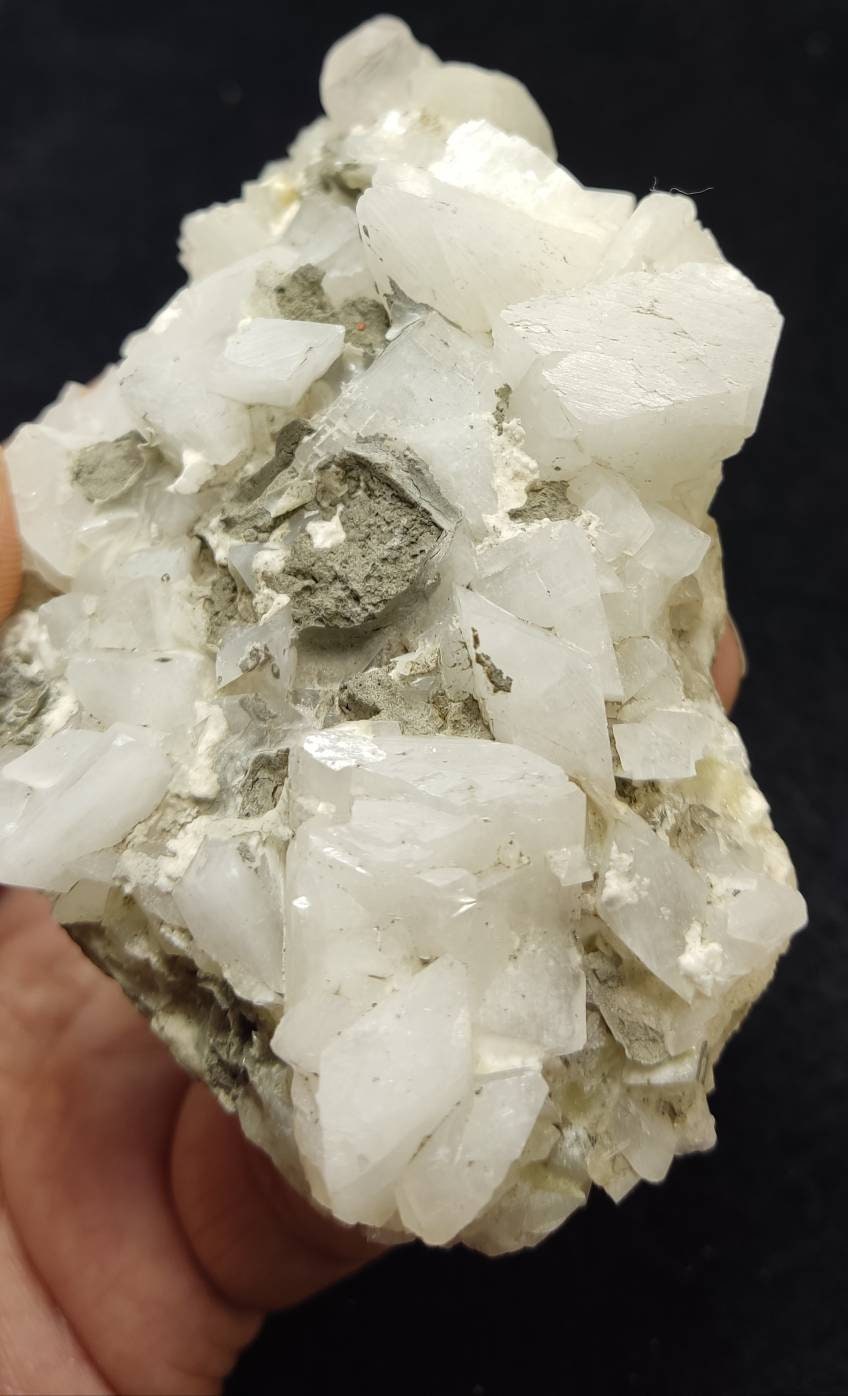 An aesthetic specimen of feldspar Adularia cluster with calcite 159 grams