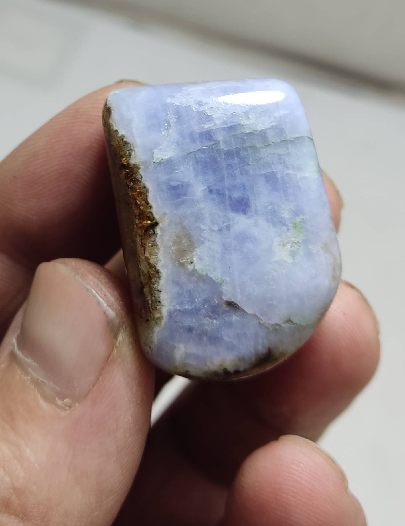 Fluorescent Hackmanite polished tumble 25 grams