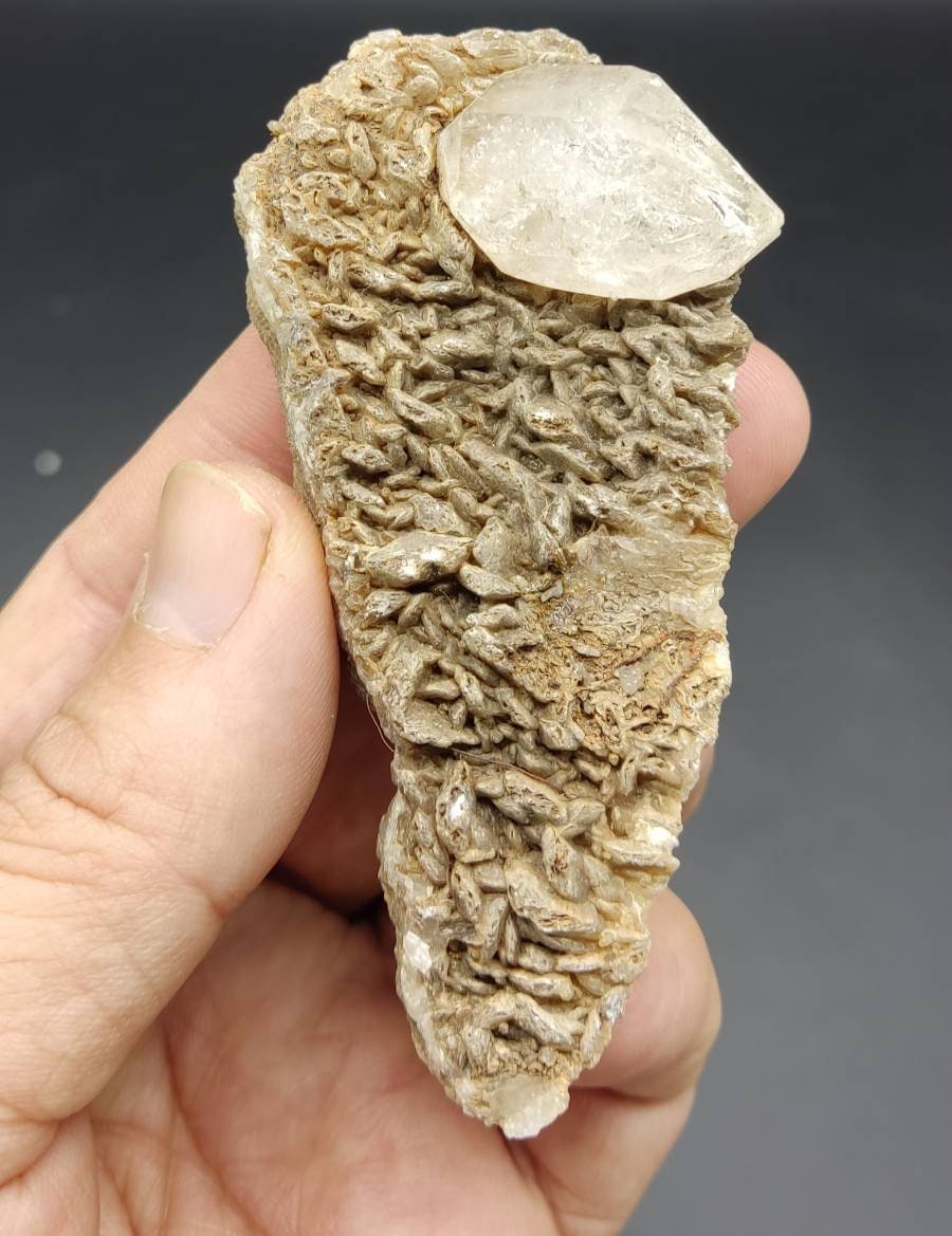 An amazing double terminated diamond like quartz crystal on matrix with calcite 74 grams