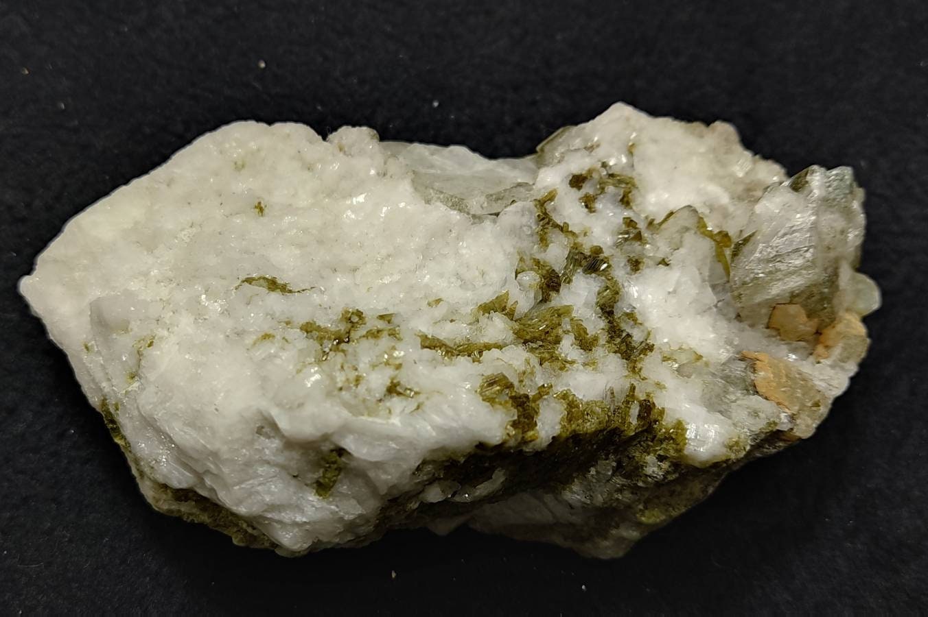 An aesthetic specimen of feldspar with calcite and epidotes 287 grams