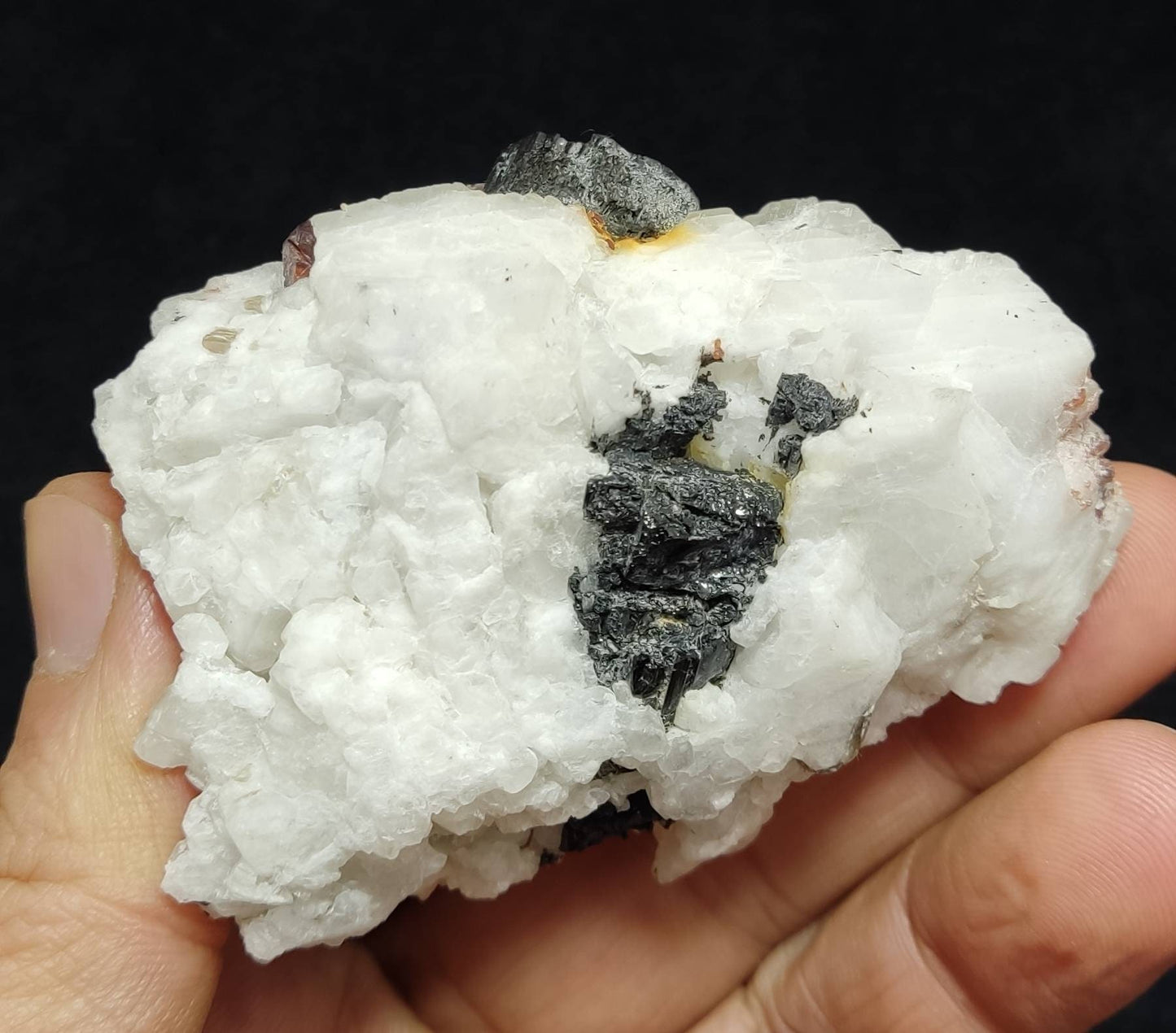 Single beautiful specimen of spessartine garnets on matrix with black tourmaline 145 grams