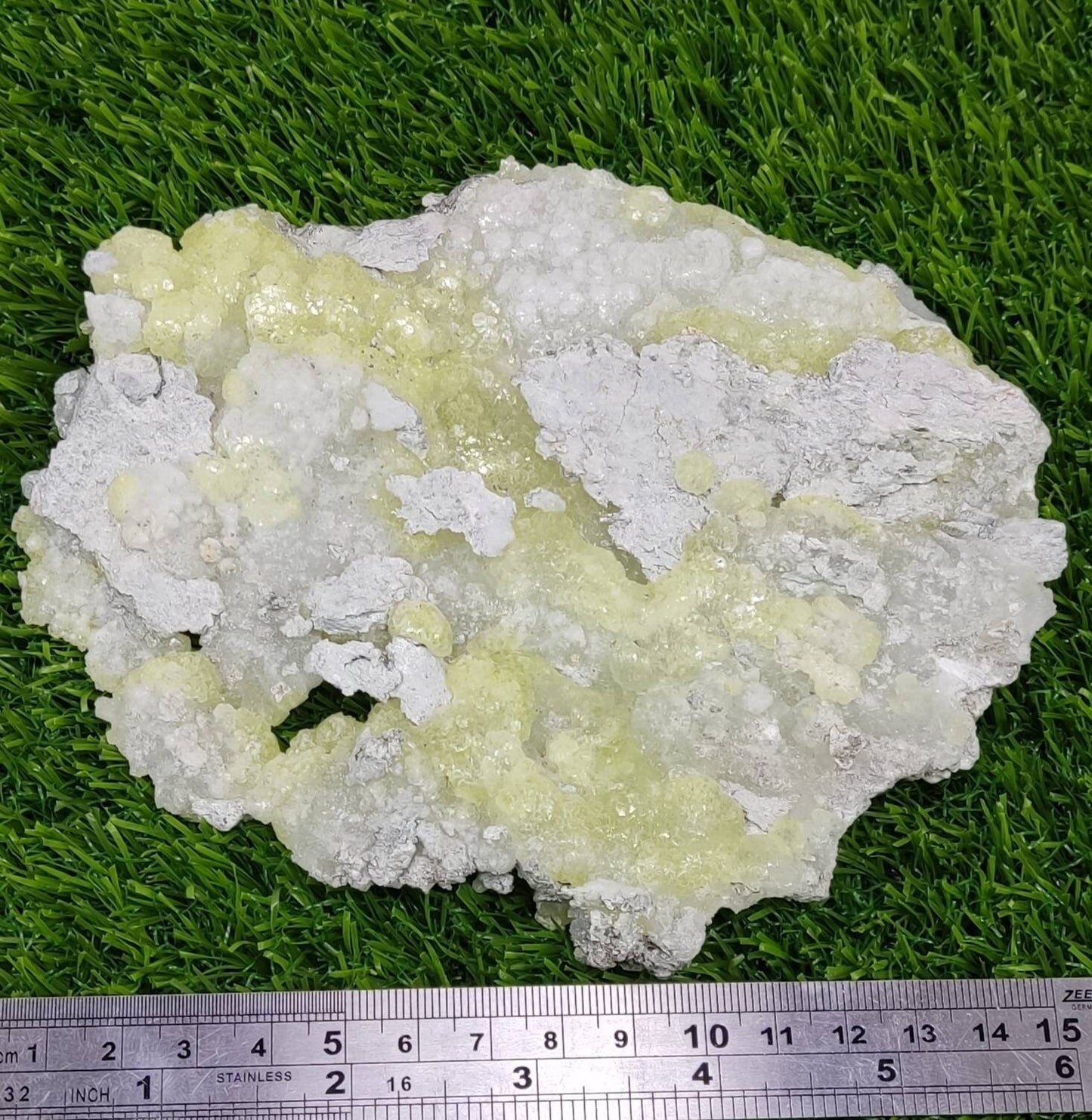 Natural yellow color Brucite in matrix 310 grams