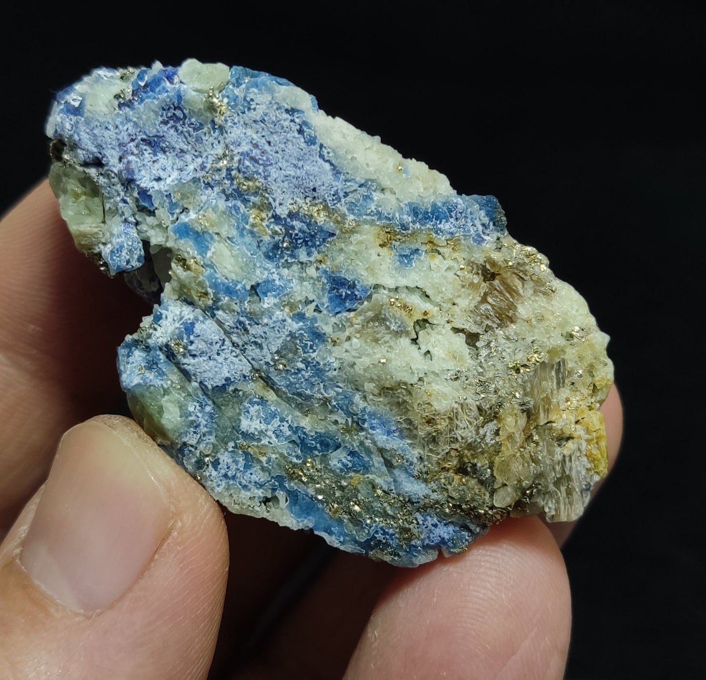 Afghanite Fluorescent in matrix with some pyrite and phlogopite 41 grams