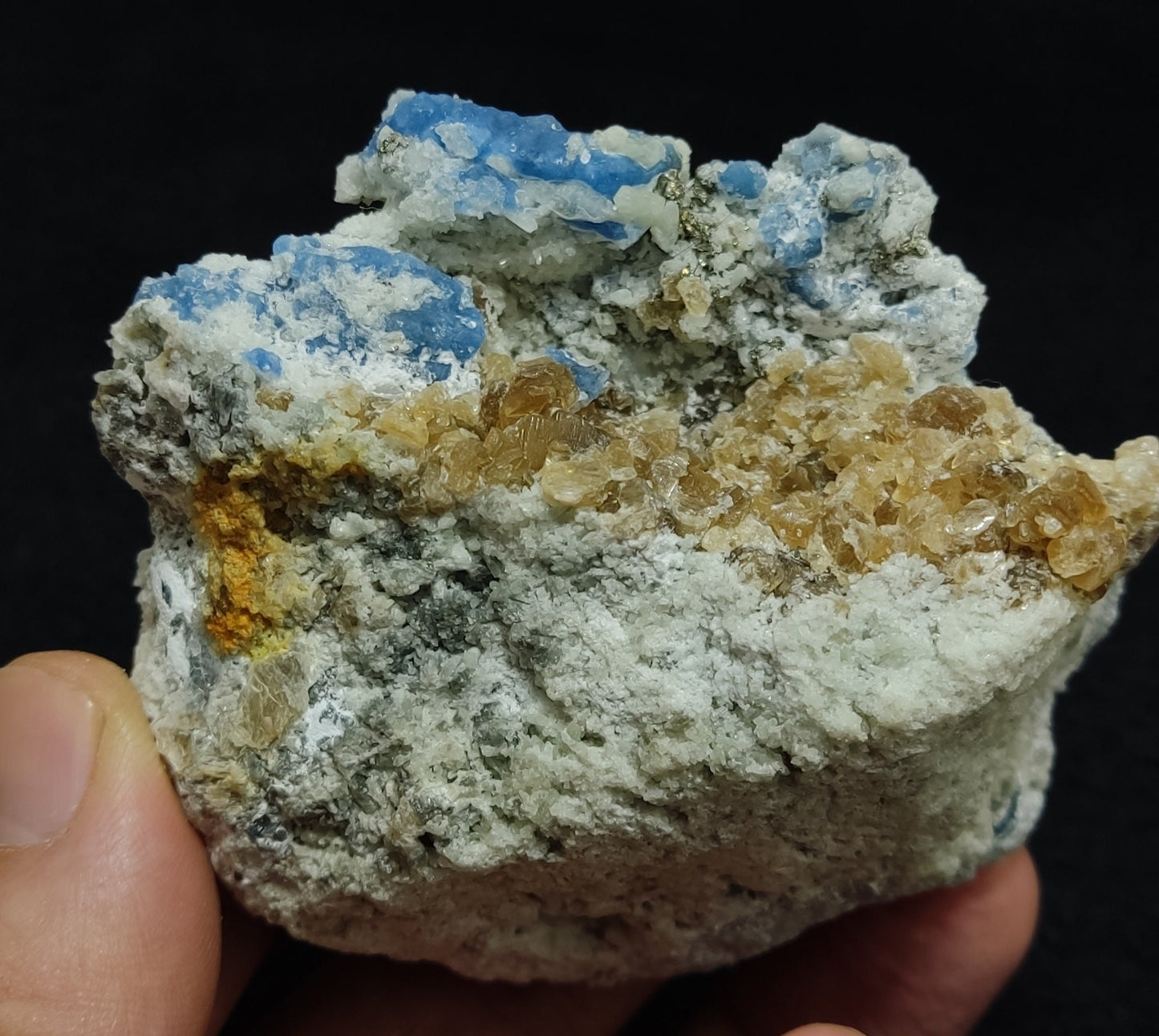 Afghanite Fluorescent in matrix with some pyrite and phlogopite 238 grams