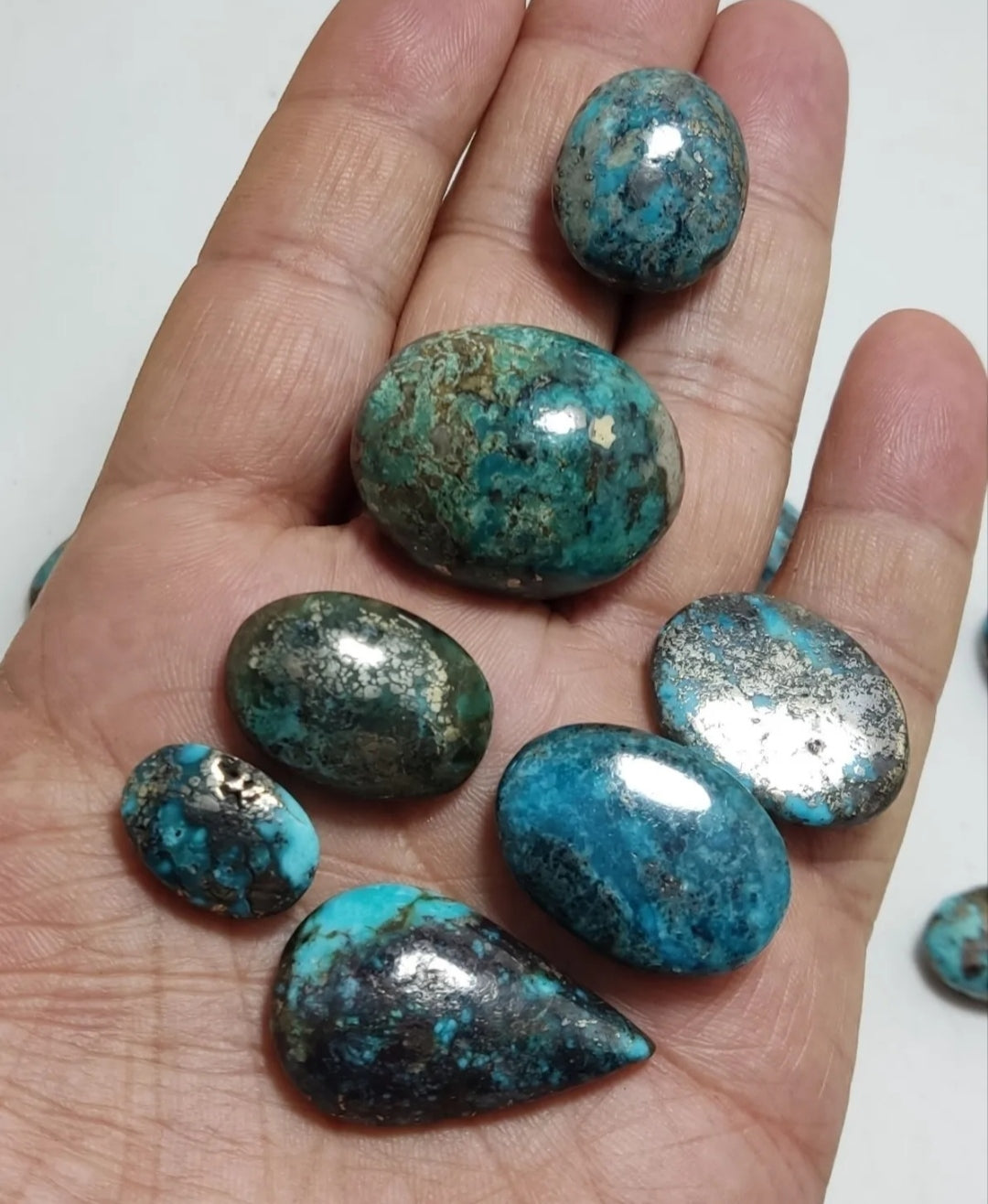 An amazing lot of turquoise cabochons 195 grams 28 pieces
