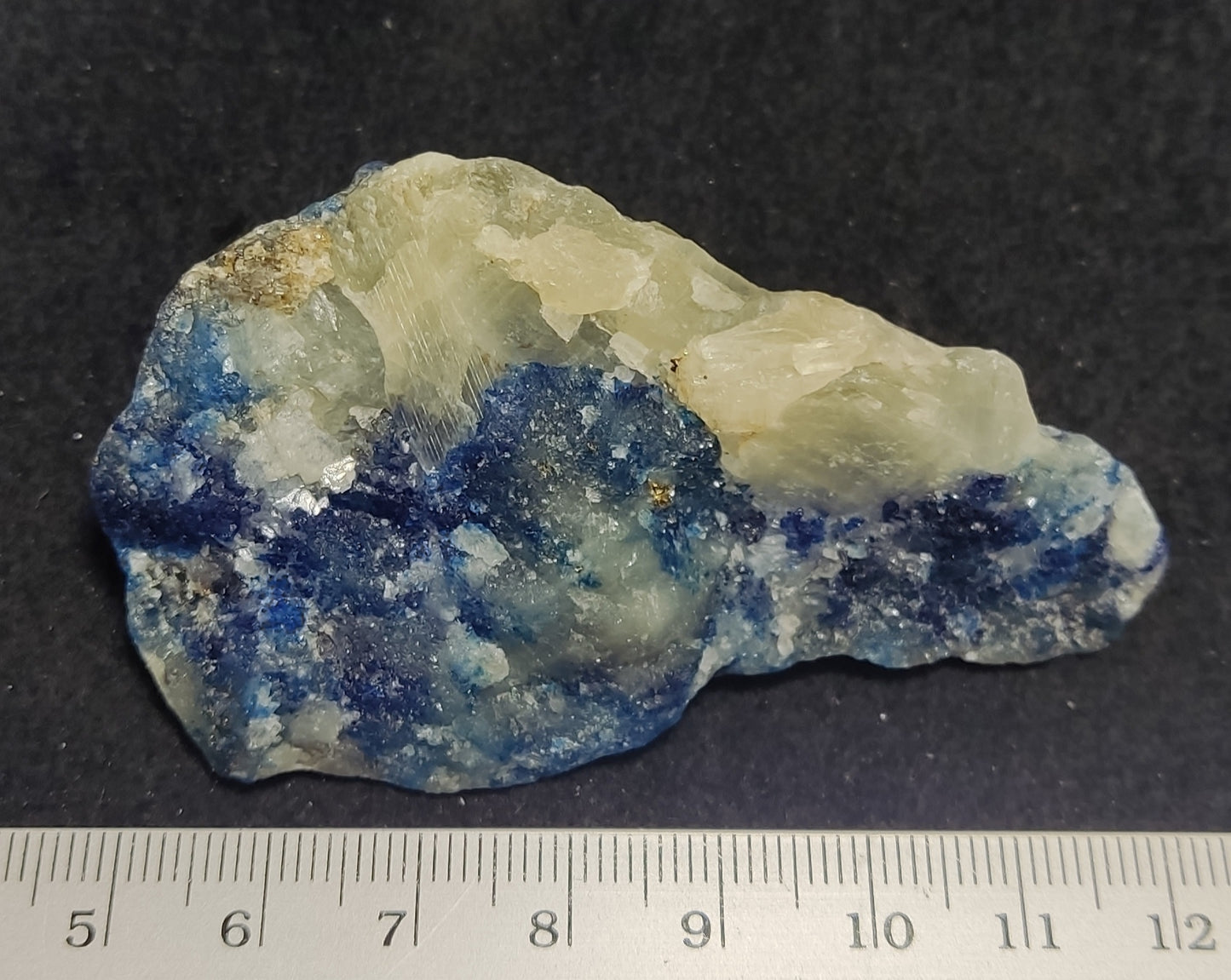 Fluorescent natural afghanite/sodalite on matrix with pyrite 63 grams