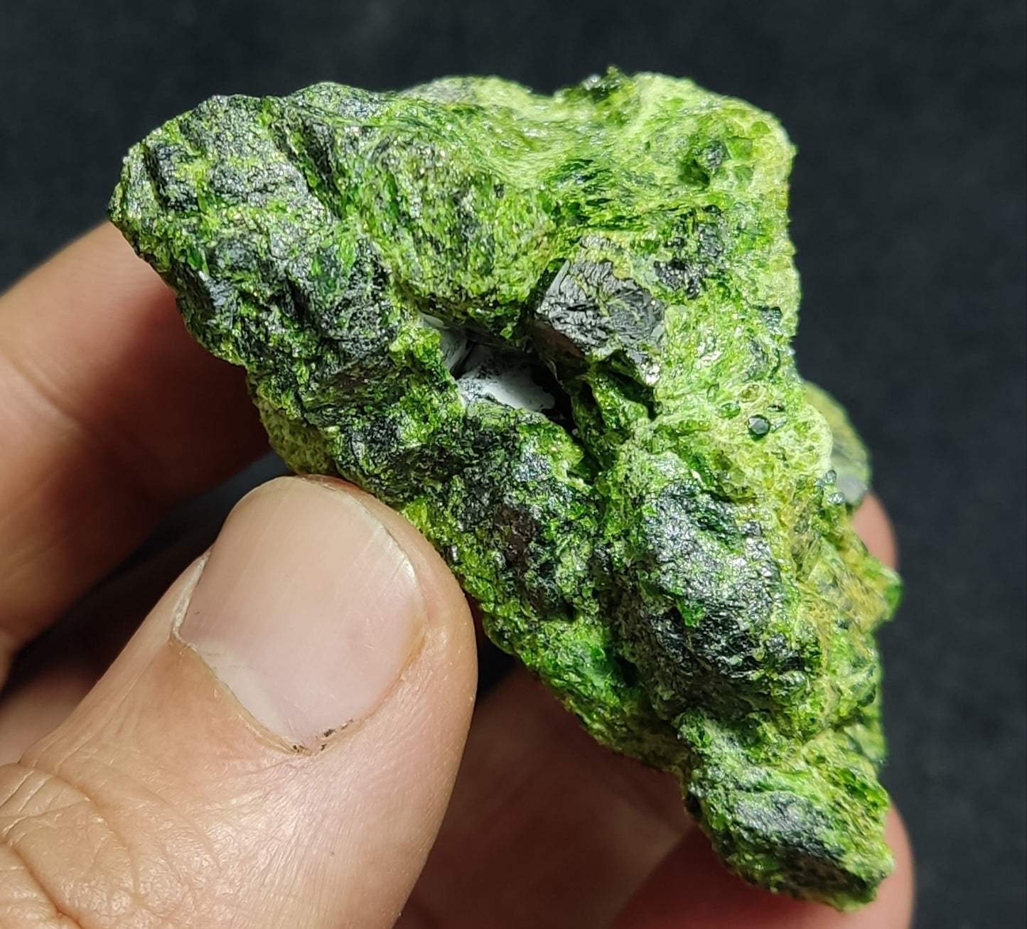 Natural demantoid garnet specimen 117 grams