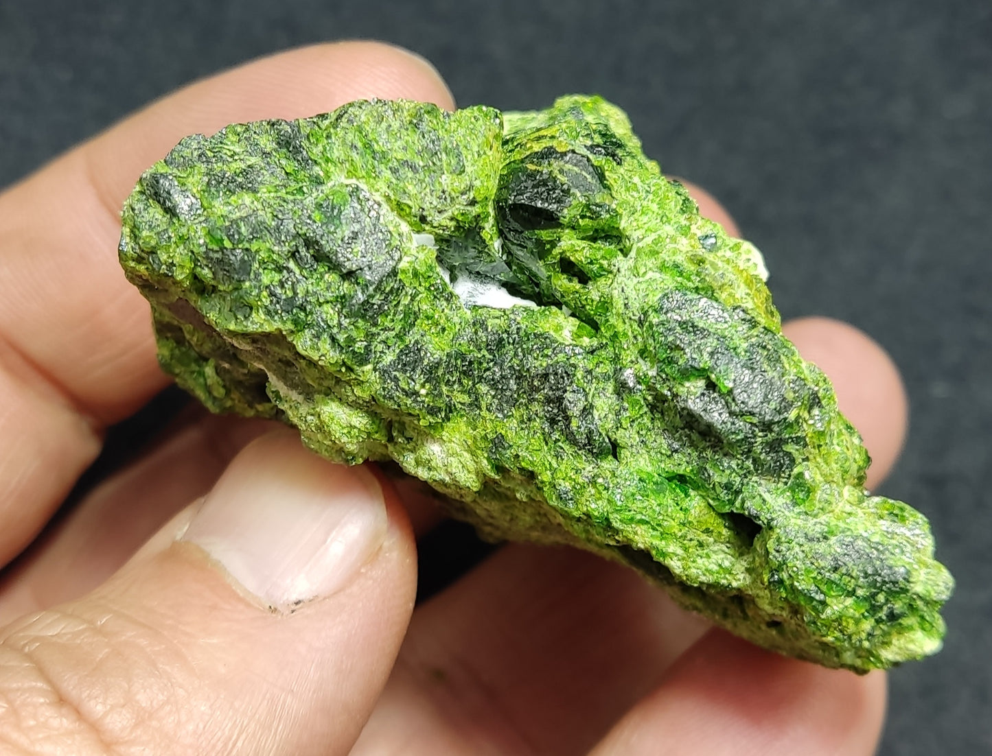 Natural demantoid garnet specimen 117 grams