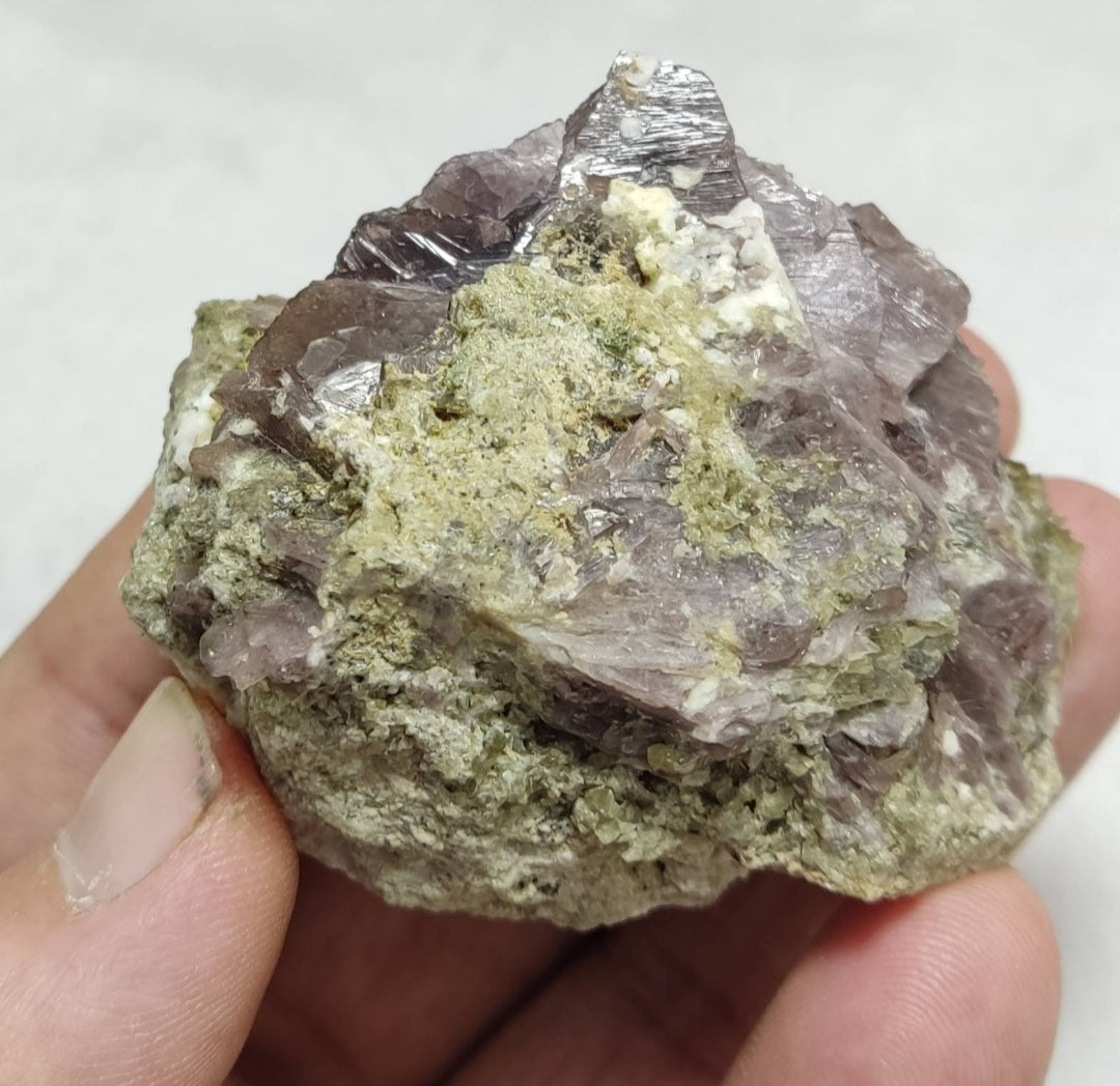 Axinite crystals on matrix with the epidote 139 grams