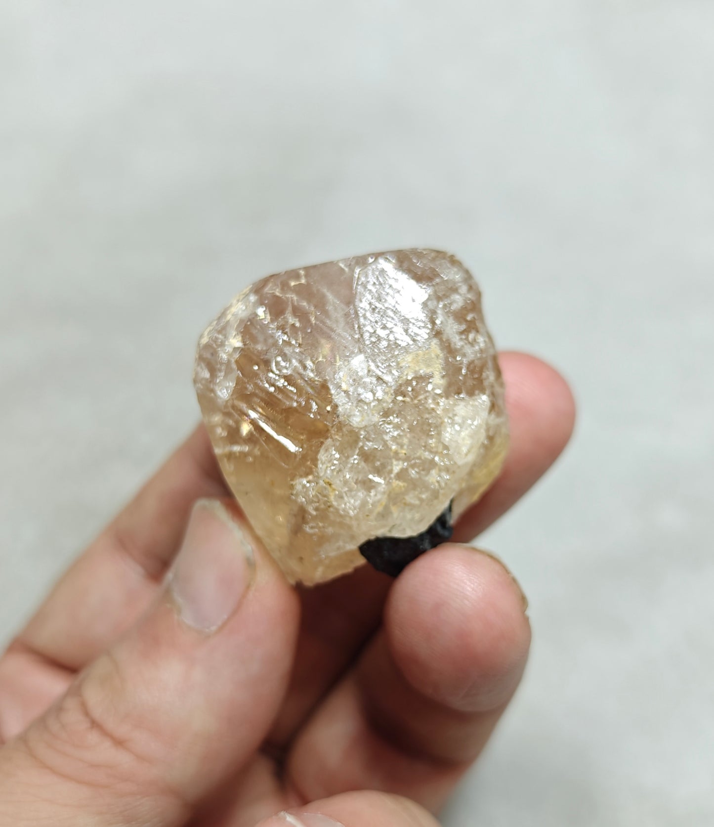 Peach color Topaz crystal with Tourmaline 68 grams